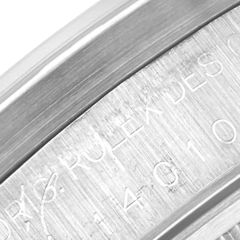 The image shows a close-up view of the engraving on the case back of a Rolex Air-King 14010 Men's Stainless Steel Black Dial 14010 Men's Stainless Steel Black Dial watch.