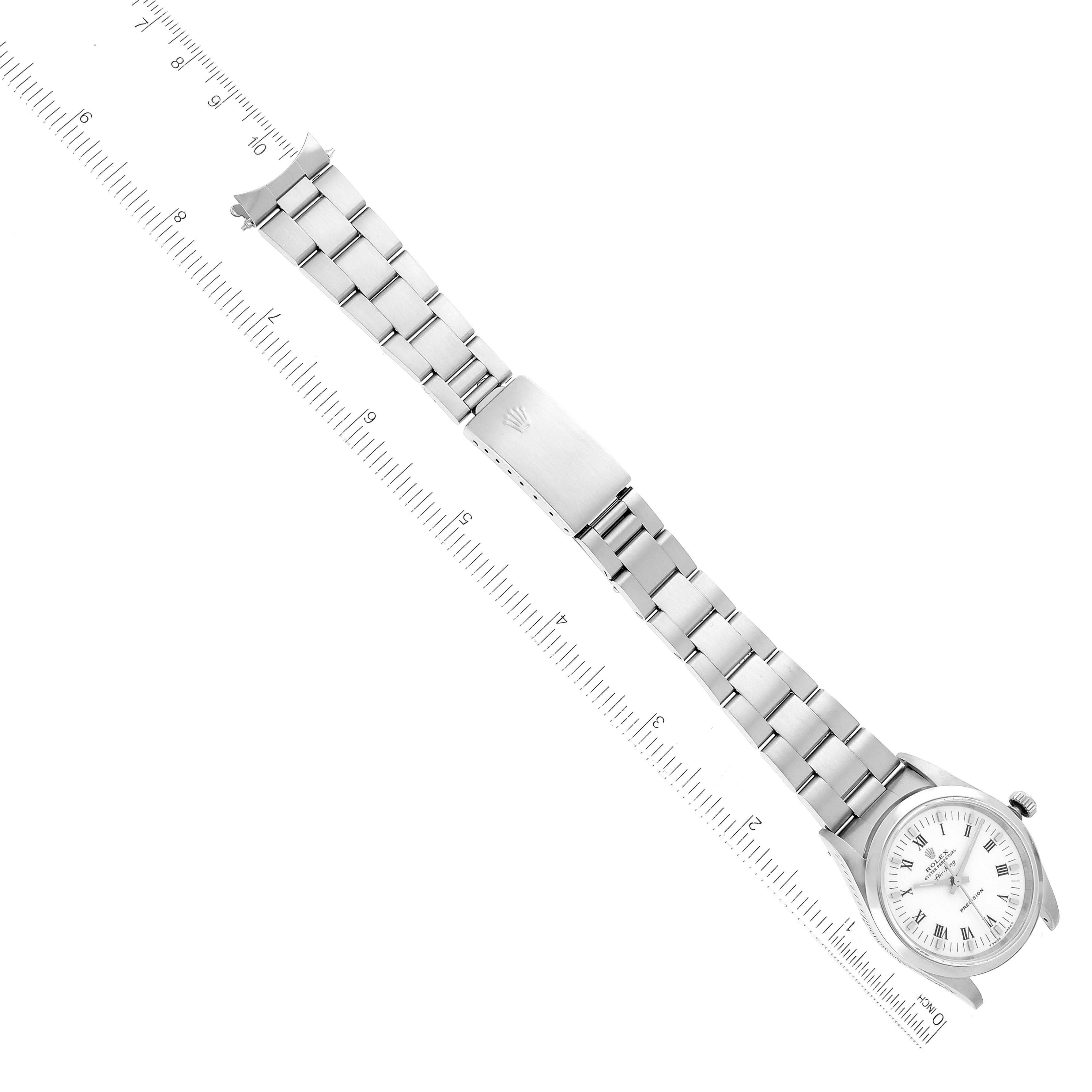 The image shows a top view of a Rolex Air-King 14000 Men's Stainless Steel White Dial 14000 Men's Stainless Steel White Dial watch, displaying the entire watch band and dial alongside a ruler for scale.