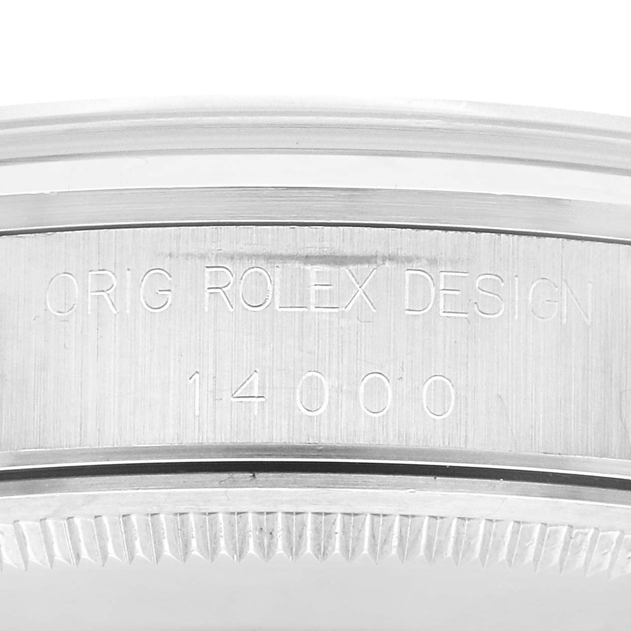 The image shows a close-up of the side engraving on the bezel of a Rolex Air-King 14000 Men's Stainless Steel White Dial 14000 Men's Stainless Steel White Dial model watch.