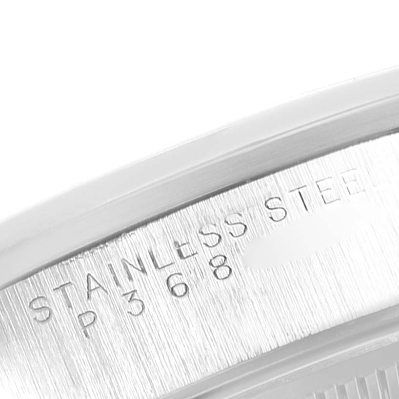 This image shows a close-up of the case back of the Rolex Date 15200 Men's Stainless Steel Black Dial 15200 Men's Stainless Steel Black Dial model watch, specifically highlighting the "STAINLESS STEEL" inscription.