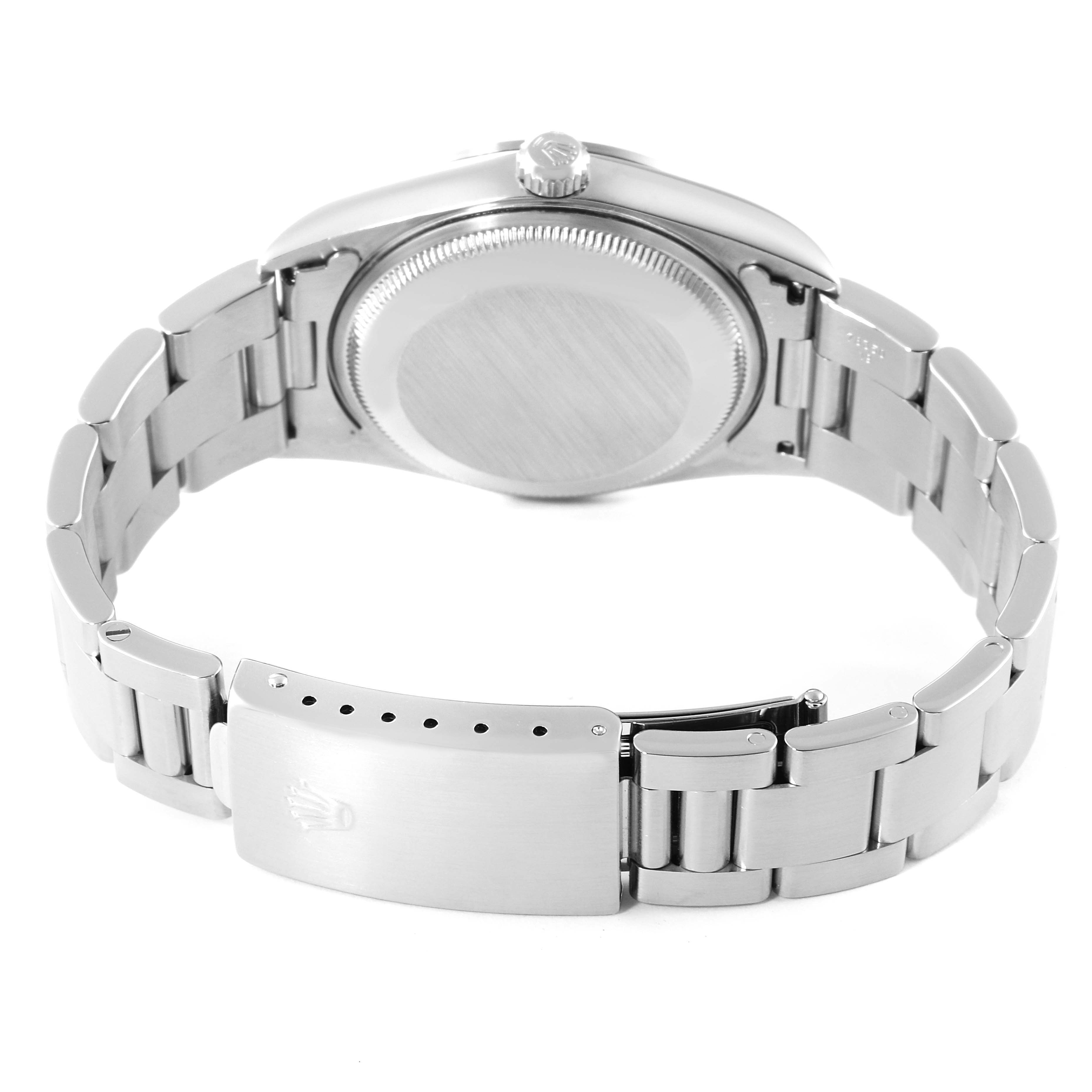 This is a rear view of a Rolex Date 15200 Men's Stainless Steel Black Dial 15200 Men's Stainless Steel Black Dial model watch, showing the case back, bracelet, and clasp.