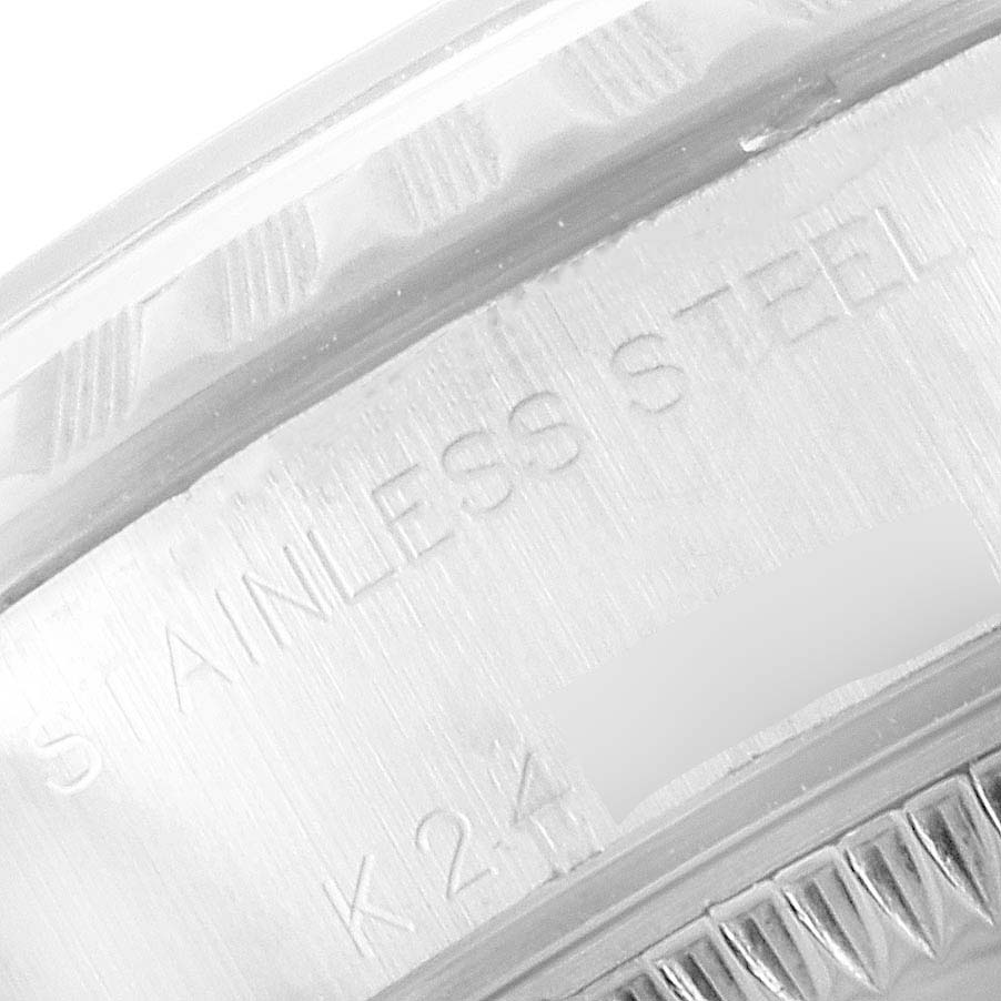 This close-up image shows the stainless steel case and fluted bezel of a Rolex Datejust 79240 Women's Stainless Steel Silver Dial 79240 Women's Stainless Steel Silver Dial watch.