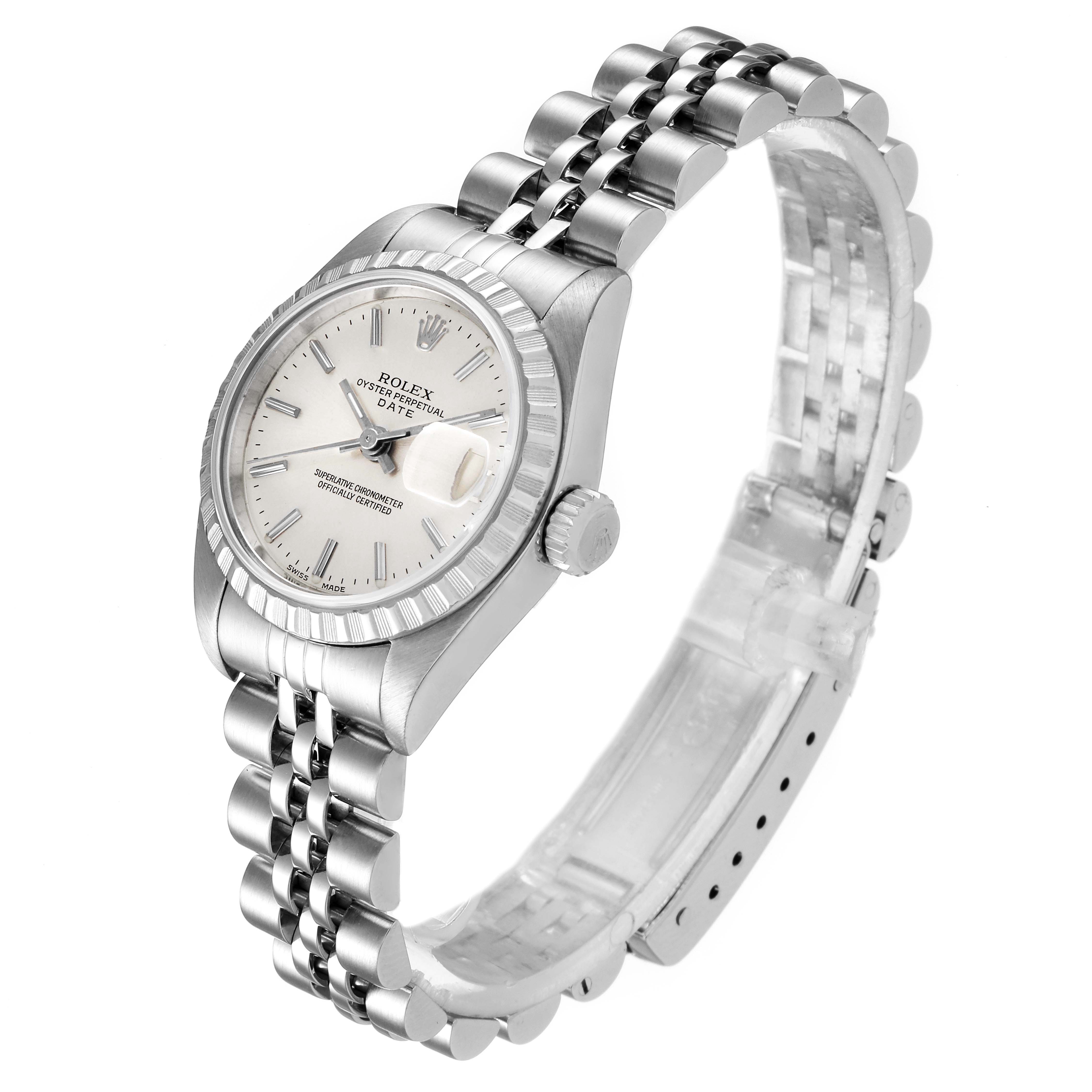 This is a side-angle view of a Rolex Datejust 79240 Women's Stainless Steel Silver Dial 79240 Women's Stainless Steel Silver Dial watch displaying the face, bezel, crown, and bracelet.