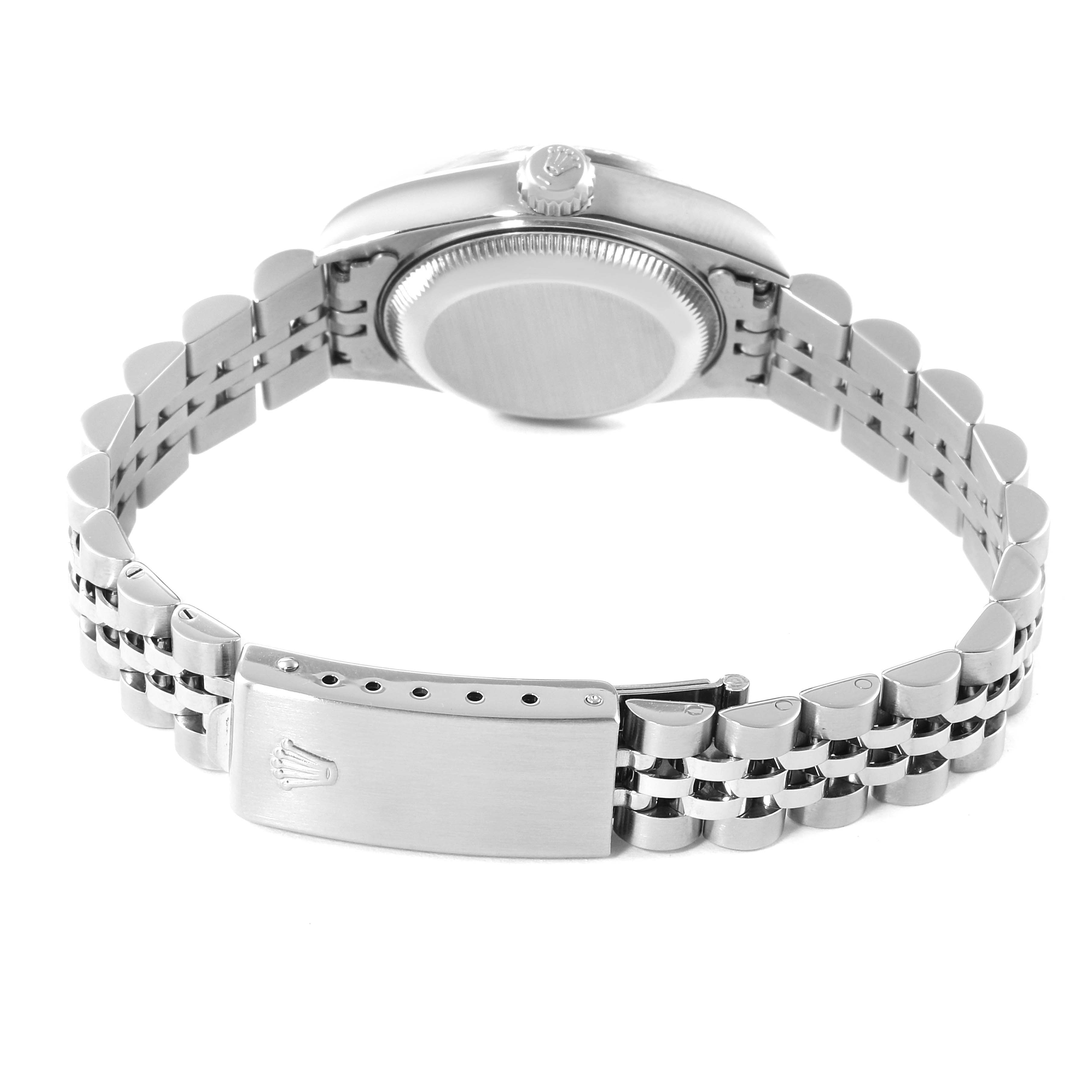 The image shows the back view of a Rolex Date 69240 Women's Stainless Steel White Dial 69240 Women's Stainless Steel White Dial watch with its stainless steel jubilee bracelet and clasp visible.