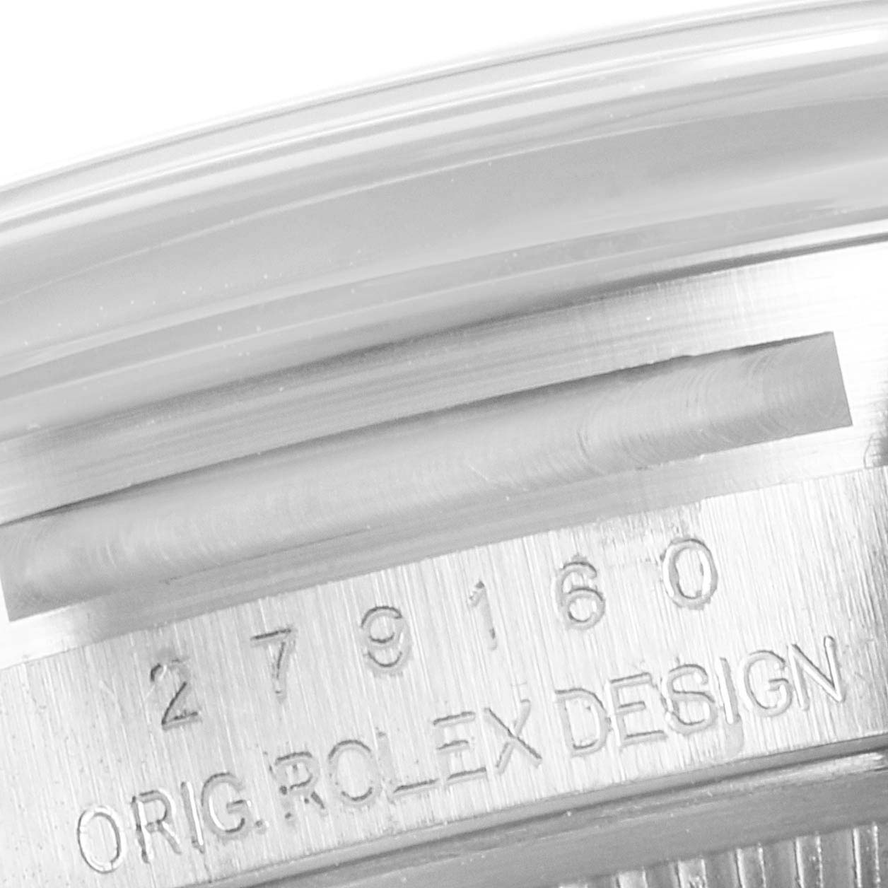 The image shows a close-up of the case side and serial number of the Rolex Datejust 279160 Women's Stainless Steel Pink Dial 279160 Women's Stainless Steel Pink Dial model.