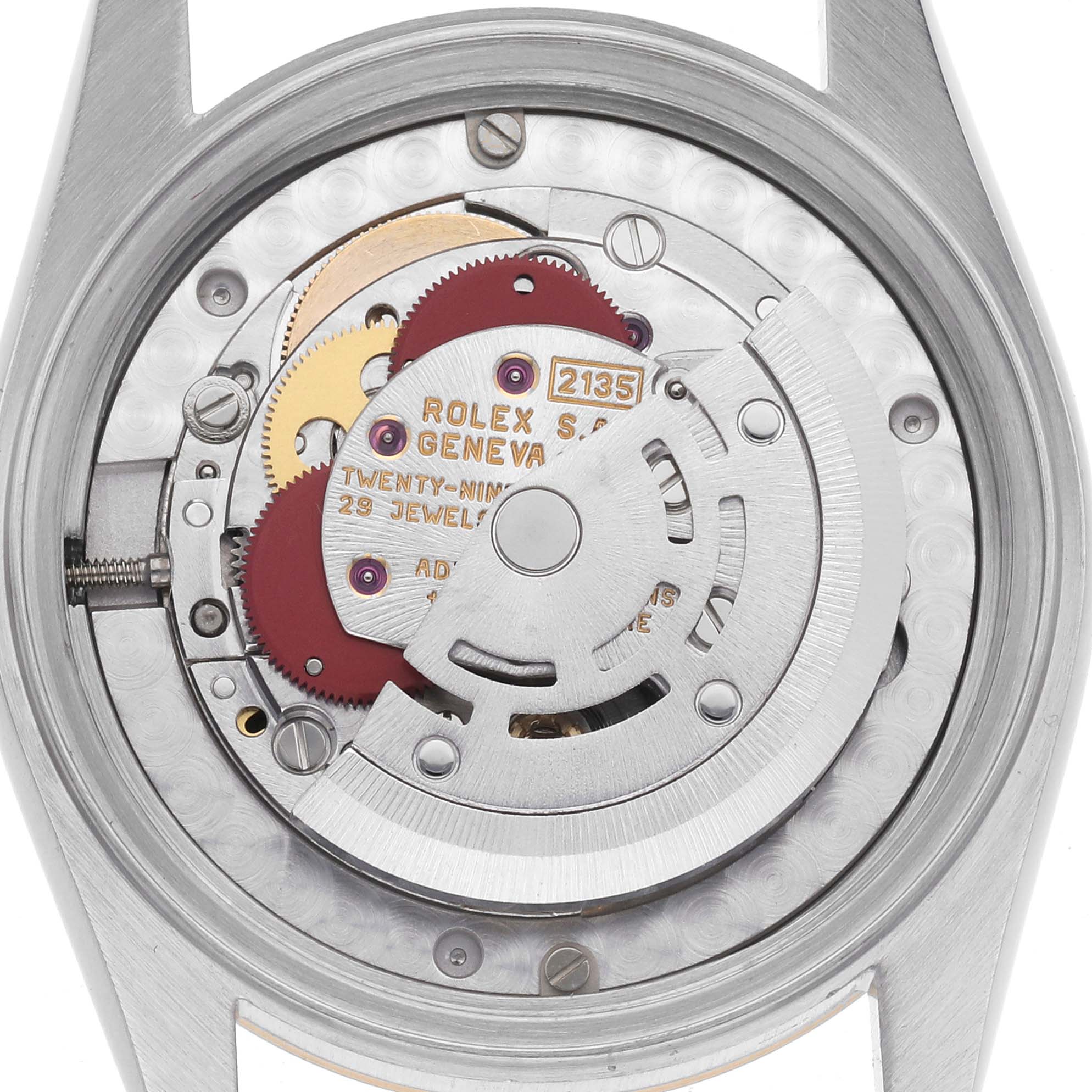 This image shows the movement and internal mechanism of a Rolex Mid-Size 68273 Women
s Steel and Gold (two tone) Champagne Dial 68273 Women
s Steel and Gold (two tone) Champagne Dial watch, viewed from the back.