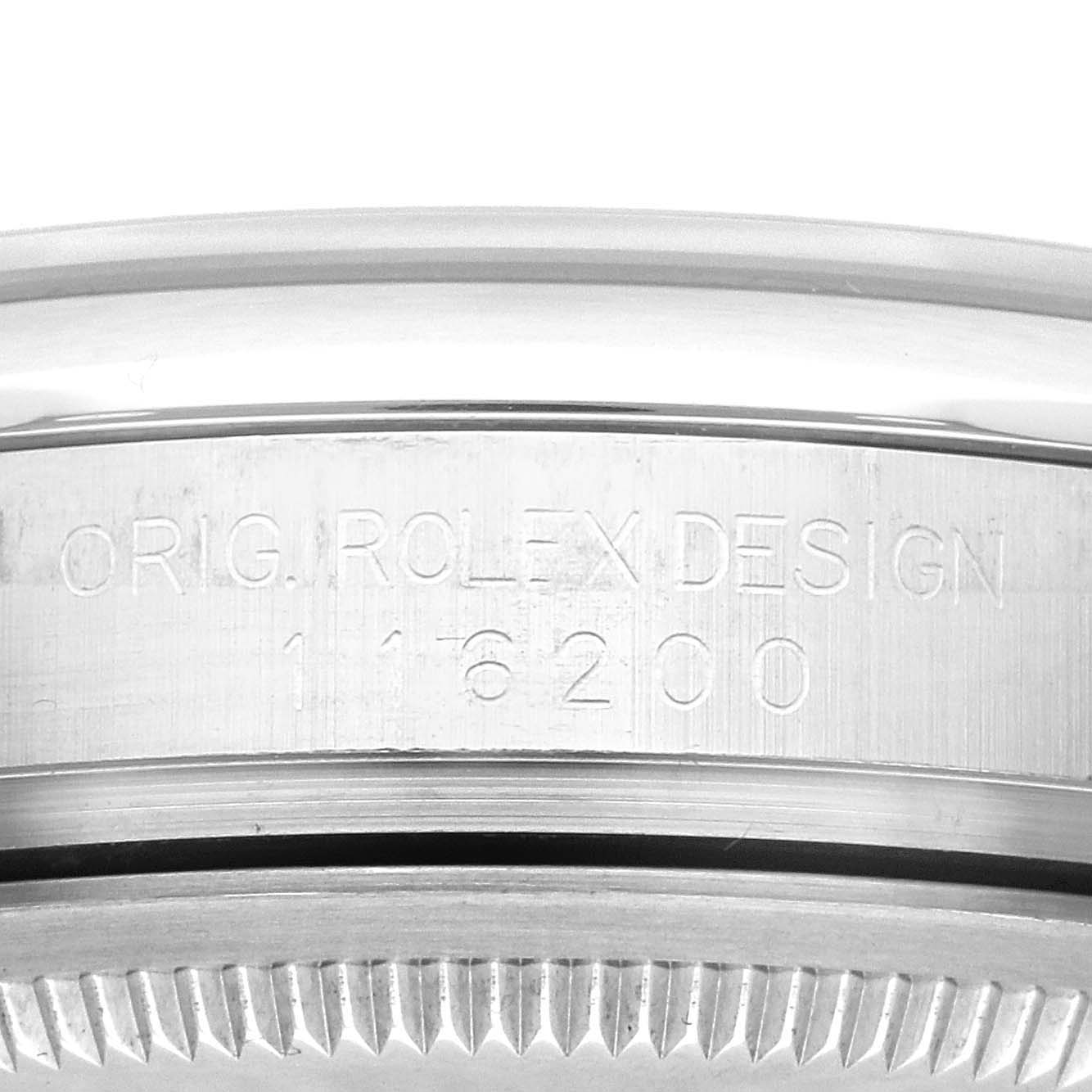 This image shows the side engraving and the bezel of a Rolex Datejust 116200 Men's Stainless Steel Black Dial 116200 Men's Stainless Steel Black Dial watch, highlighting "ORIG. ROLEX DESIGN" and the model number.
