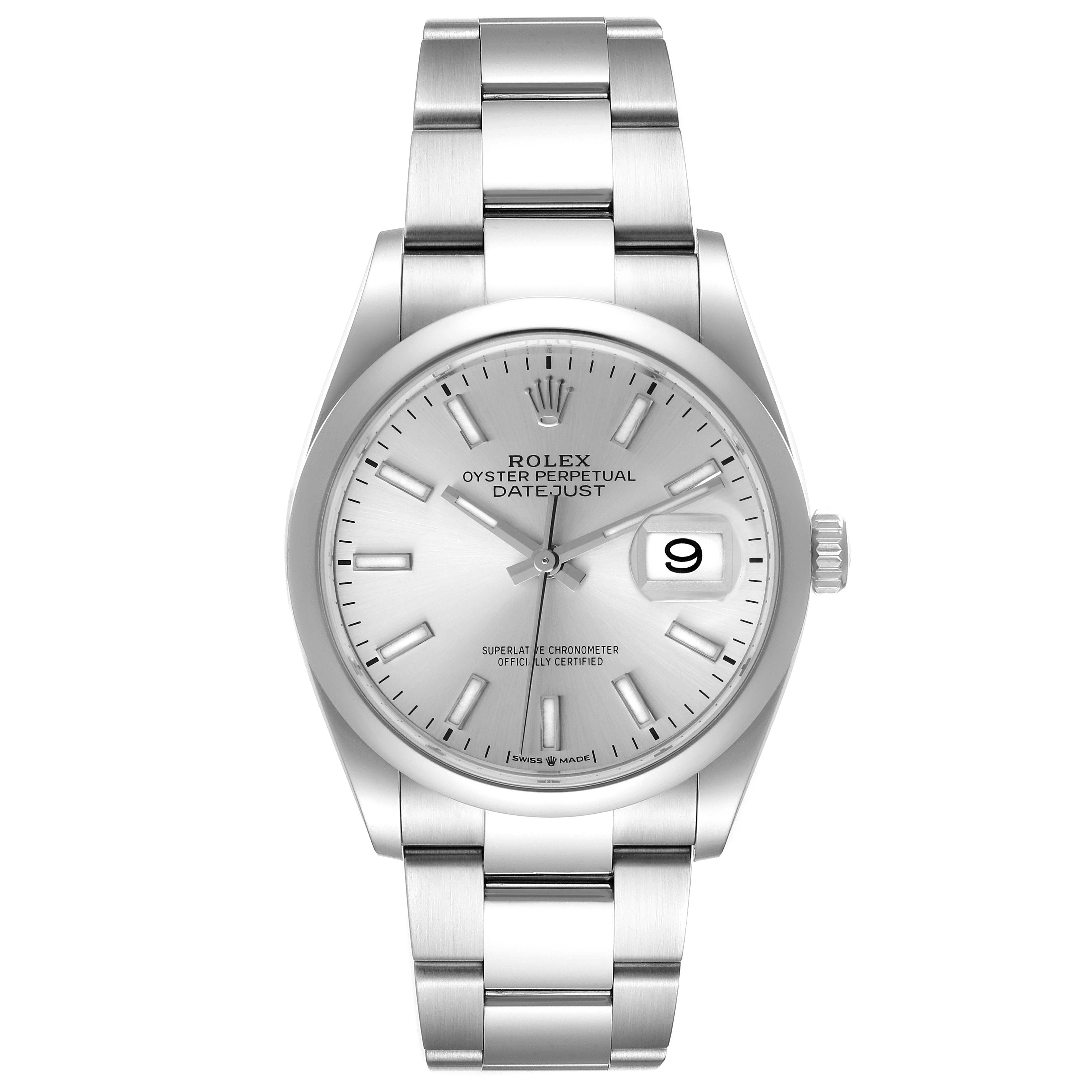 The image shows a front view of a Rolex Datejust 126200 Men's Stainless Steel Silver Dial 126200 Men's Stainless Steel Silver Dial watch, highlighting the dial, hands, numeral markers, date window, and bracelet.