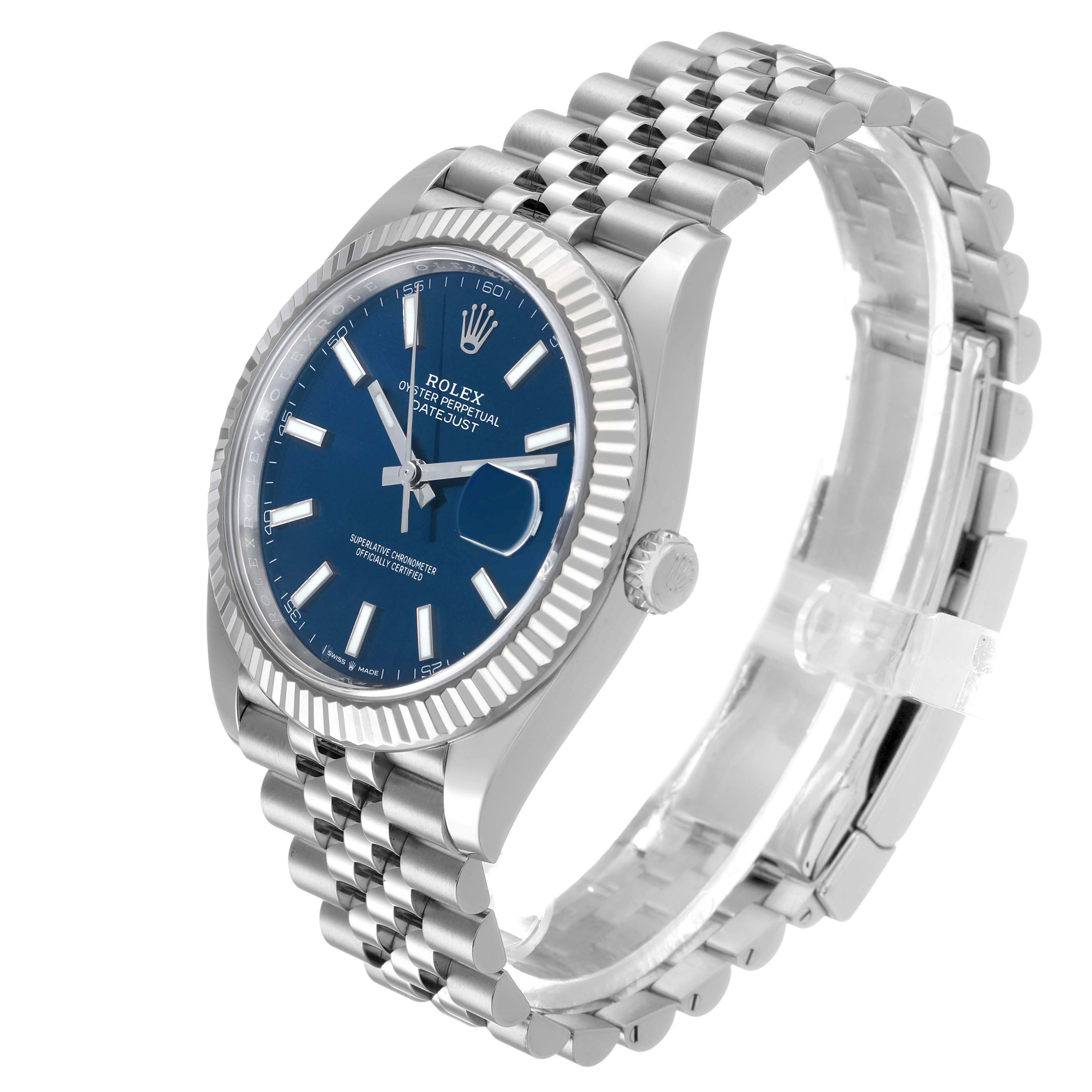 The Rolex Datejust 41 126334 Men's Stainless Steel Blue Dial is shown at a three-quarter angle, highlighting the blue dial, fluted bezel, and Jubilee bracelet.