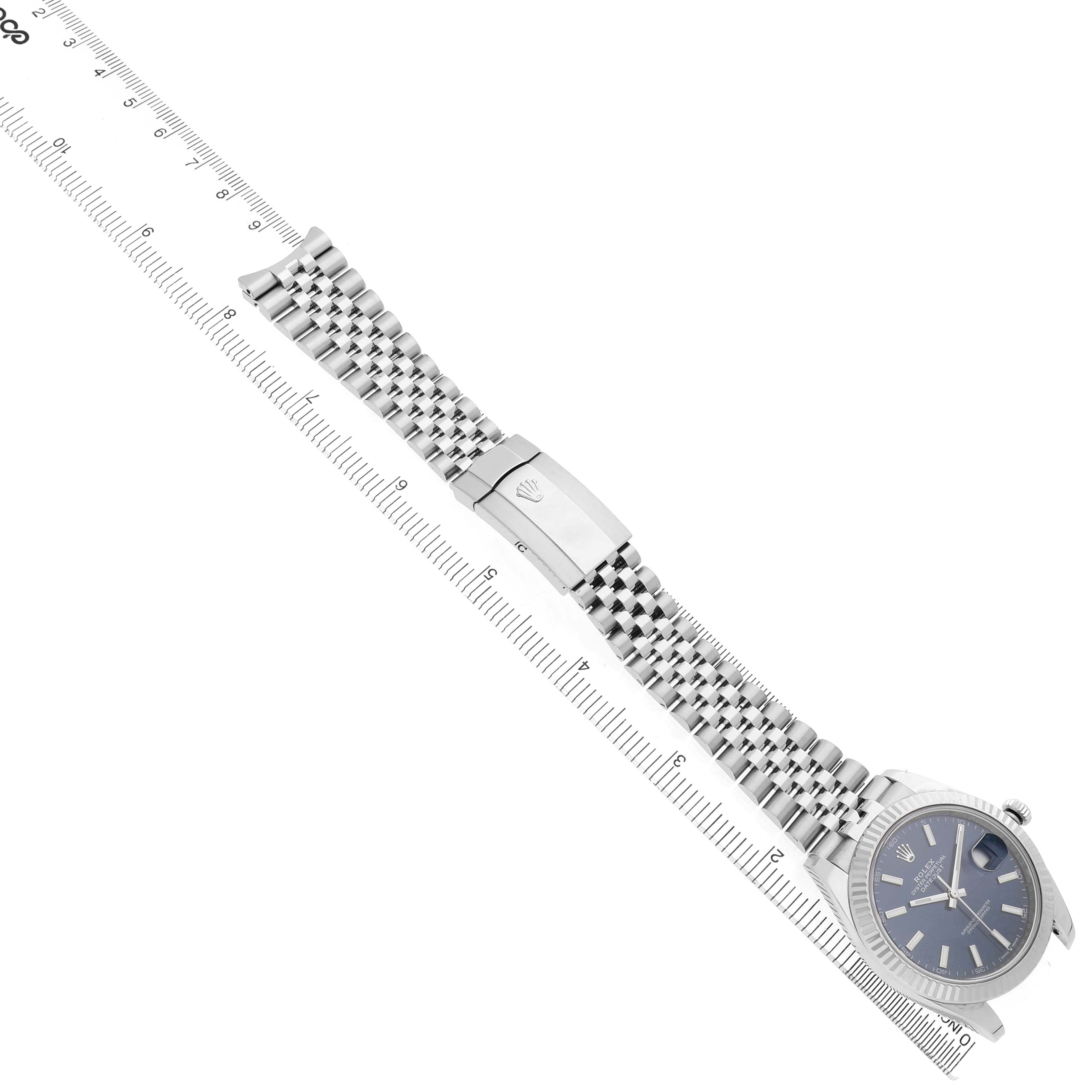 The Rolex Datejust 41 126334 Men's Stainless Steel Blue Dial watch is shown at an angle displaying the face, fluted bezel, and Jubilee bracelet with clasp.