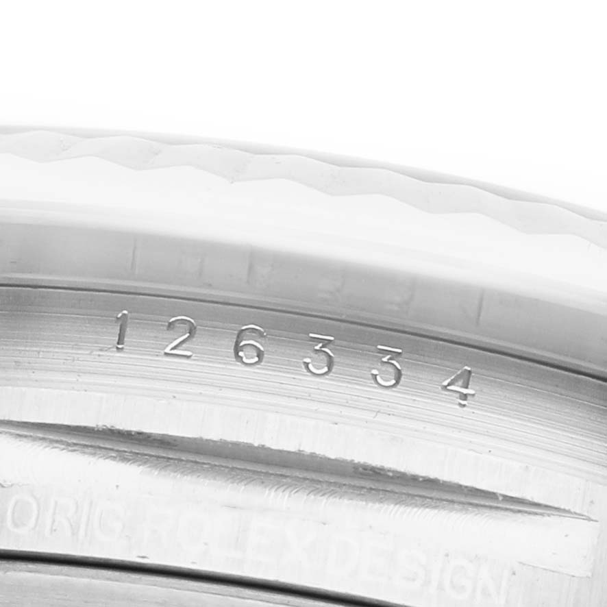 The image shows a close-up of the model number on the inner bezel of a Rolex Datejust 41 126334 Men's Stainless Steel Blue Dial watch.