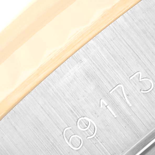 This close-up image shows the model number engraving on the side of the Rolex Datejust 69173 Women's Steel and Gold (two tone) Champagne Dial 69173 Women's Steel and Gold (two tone) Champagne Dial watch.