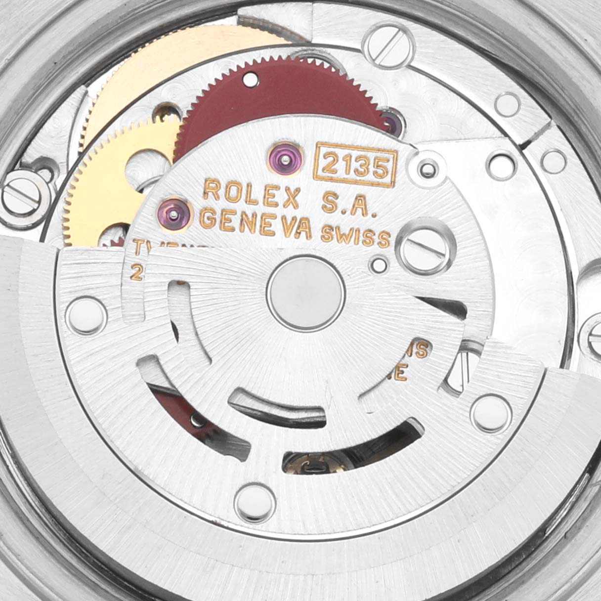 This image shows a close-up of the movement of a Rolex Datejust 69173 Women's Steel and Gold (two tone) White Dial 69173 Women's Steel and Gold (two tone) White Dial, highlighting the internal gears and mechanisms.