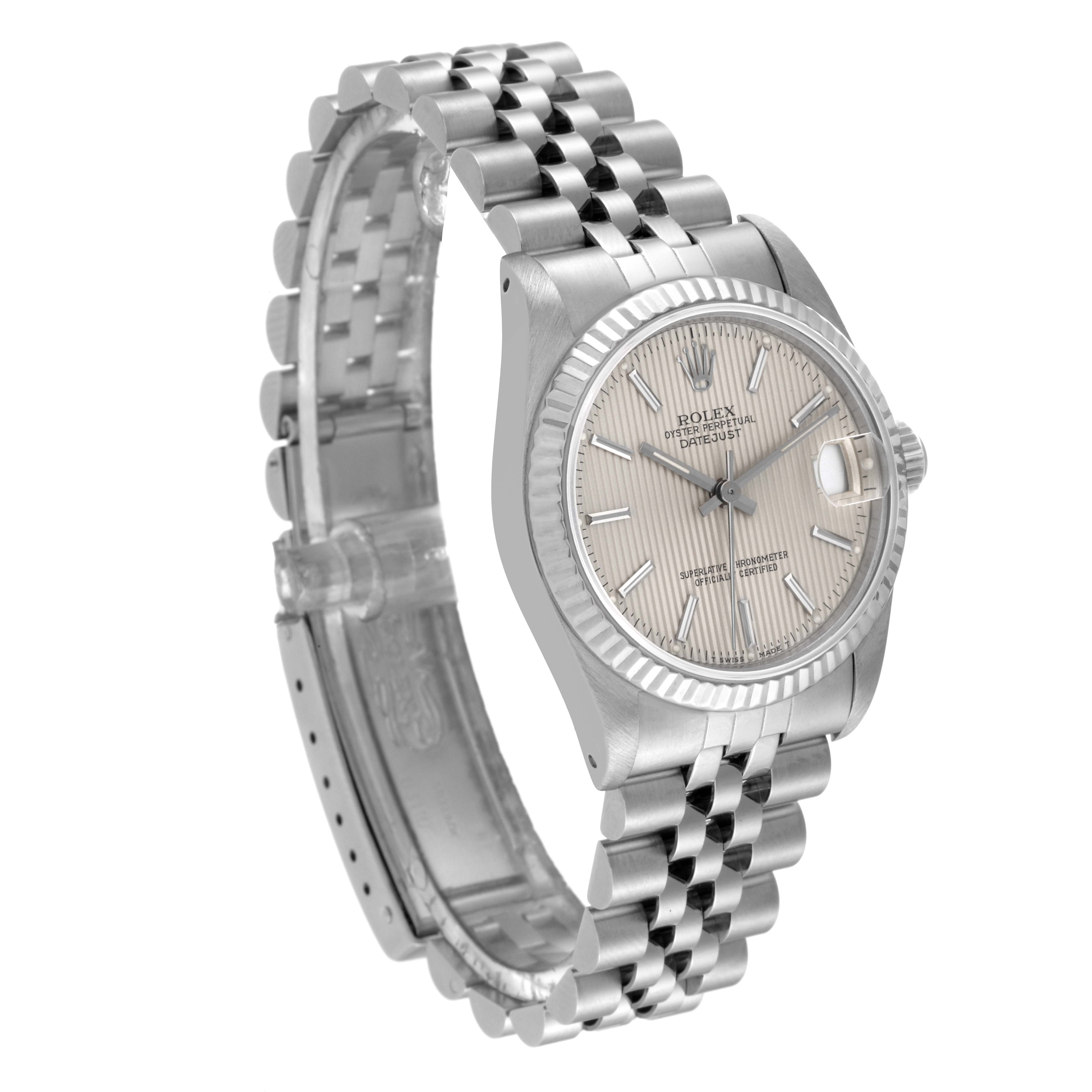The Rolex Mid-Size 68274 Women
s Stainless Steel Silver Dial 68274 Women
s Stainless Steel Silver Dial model watch is shown at a slight angle, highlighting the face, fluted bezel, and jubilee bracelet.