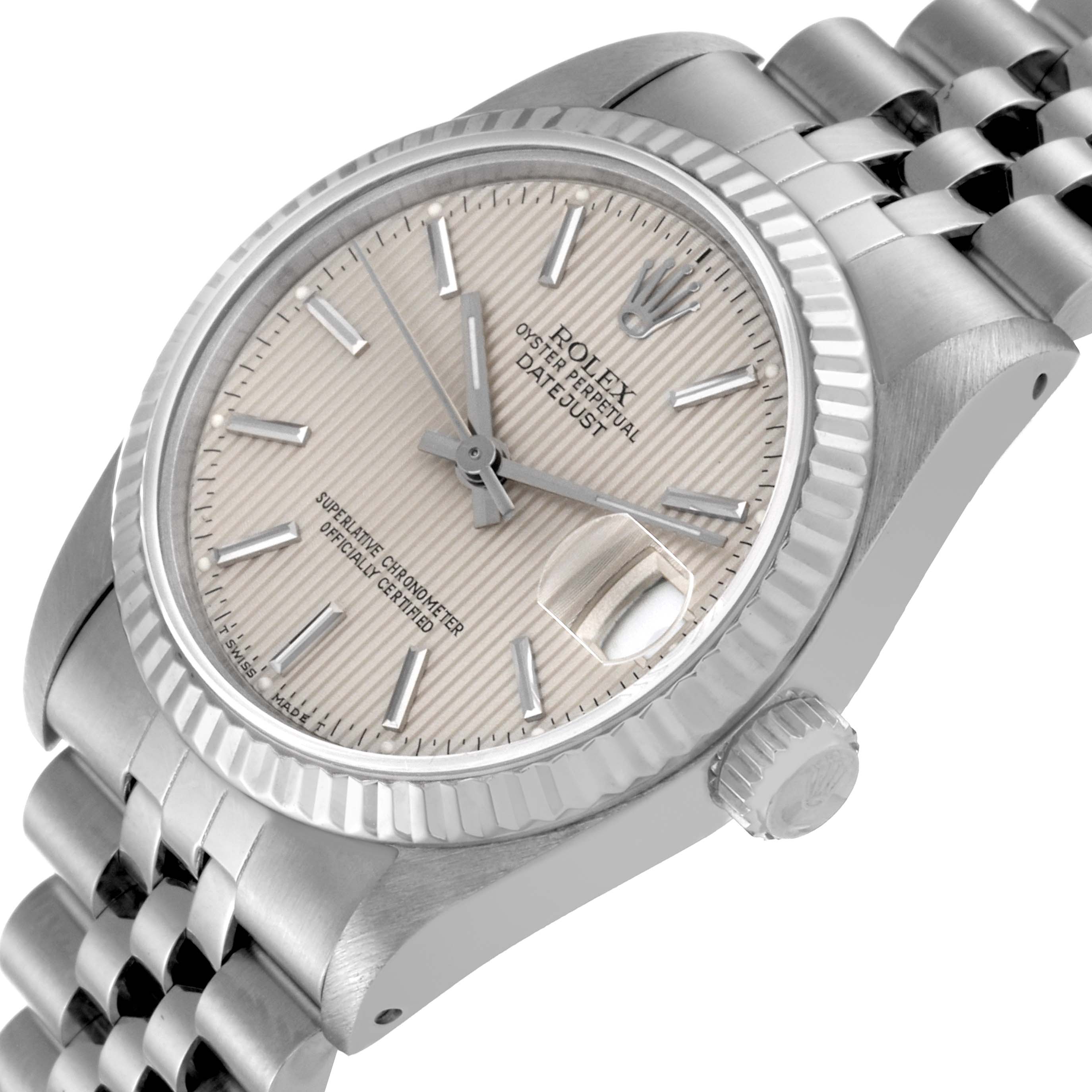 The image shows a close-up angled view of the dial and part of the bracelet of a Rolex Mid-Size 68274 Women
s Stainless Steel Silver Dial 68274 Women
s Stainless Steel Silver Dial Datejust watch.