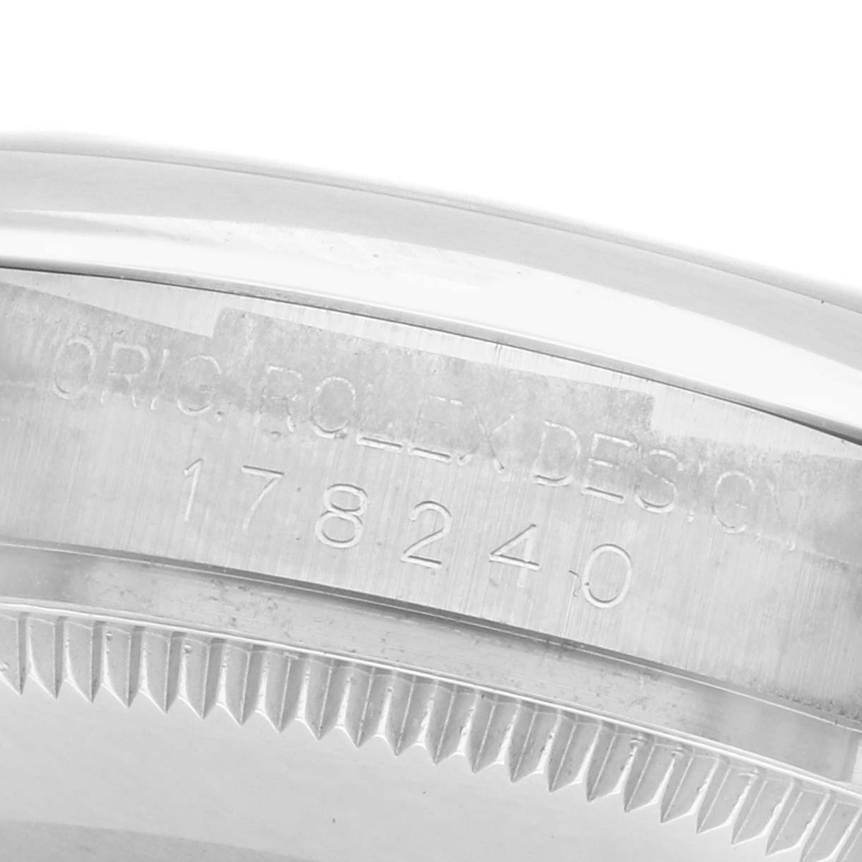 The image shows a close-up of the bezel and engraving on the side of a Rolex Mid-Size 178240 Women
s Stainless Steel Silver Dial 178240 Women
s Stainless Steel Silver Dial model, displaying the model number "178240".
