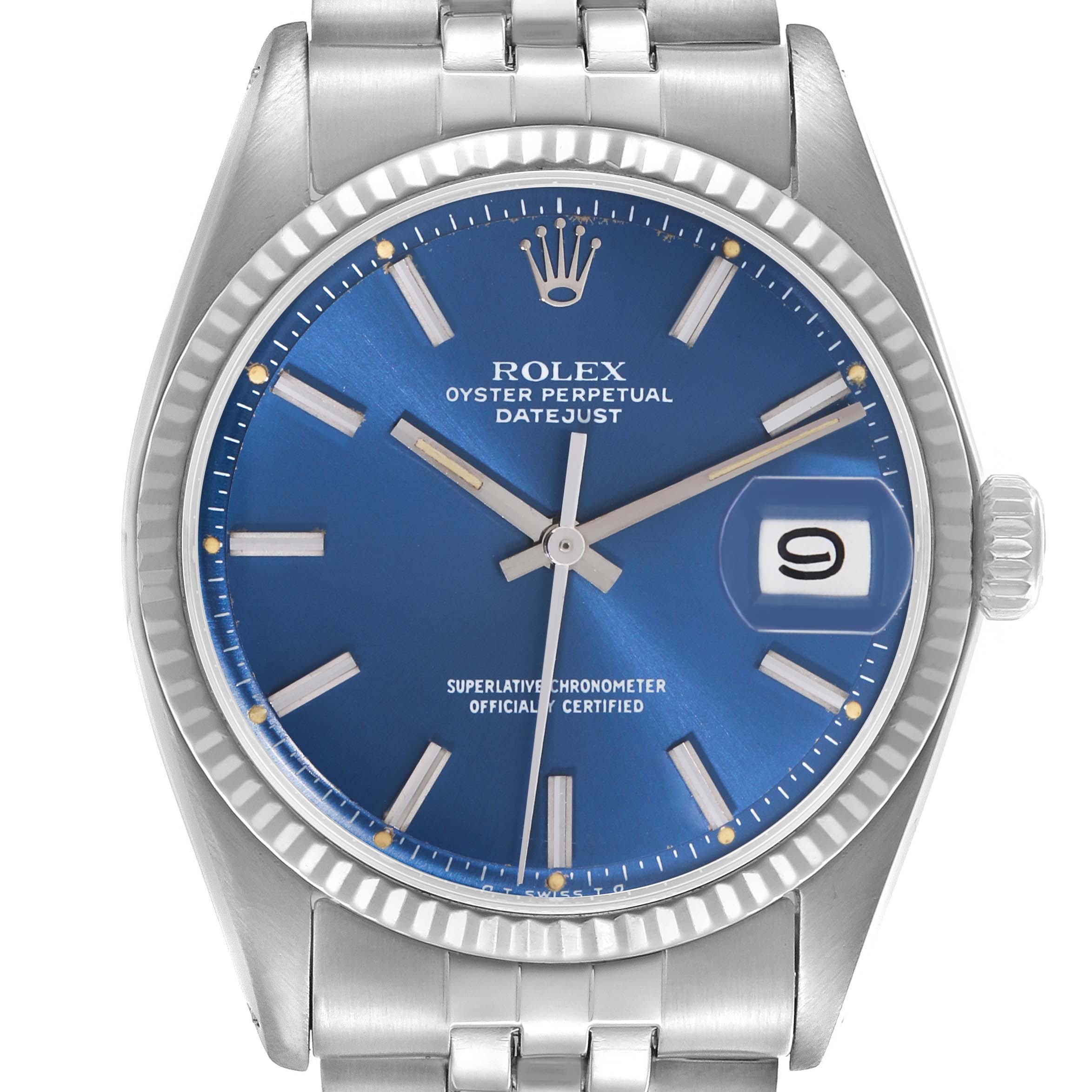 The Rolex Datejust 1601 Men
s Stainless Steel Blue Dial 1601 Men
s Stainless Steel Blue Dial watch is shown from a front angle, highlighting its dial, bezel, and bracelet.