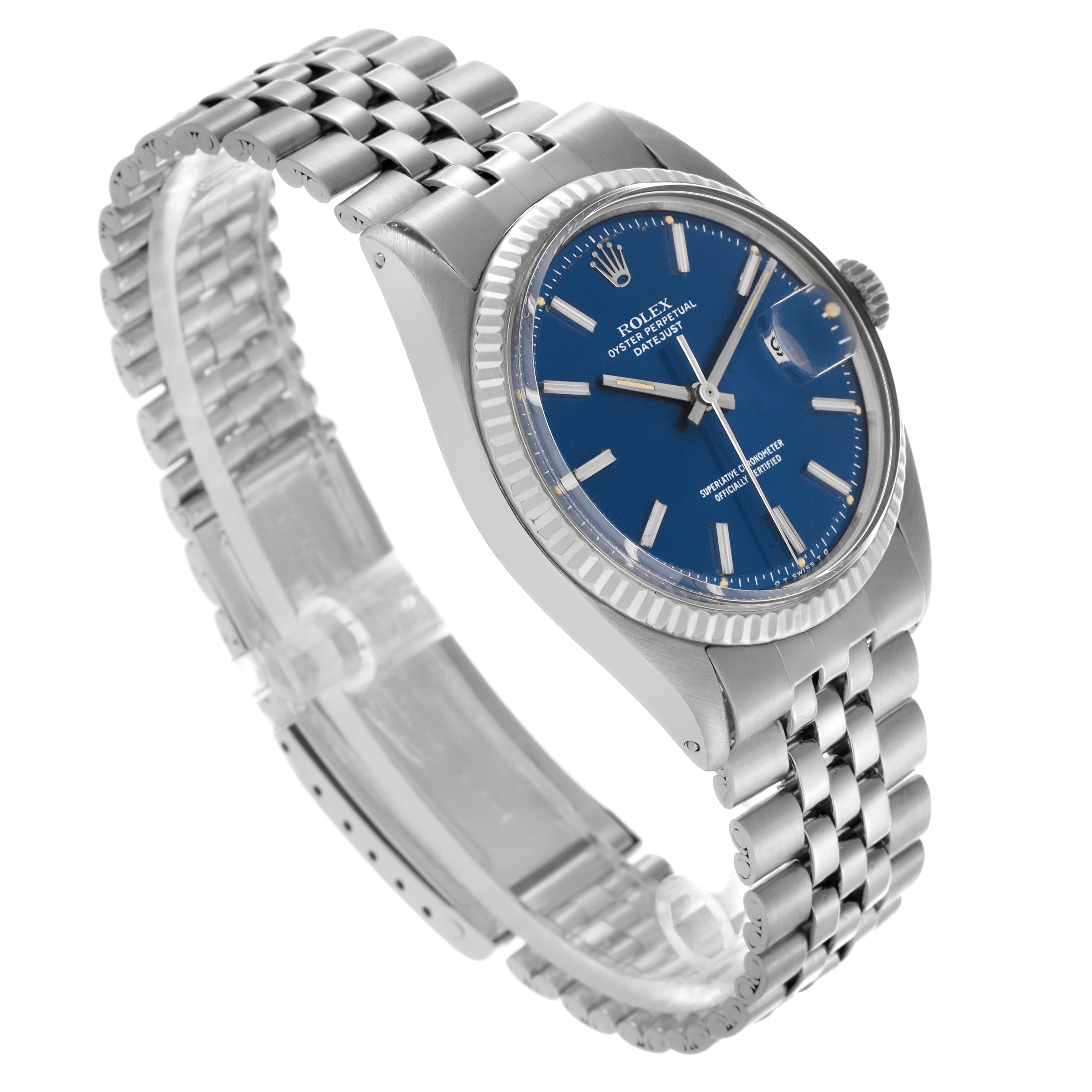 The Rolex Datejust 1601 Men
s Stainless Steel Blue Dial 1601 Men
s Stainless Steel Blue Dial watch is shown at an angled side view highlighting the blue dial, bezel, crown, and bracelet.