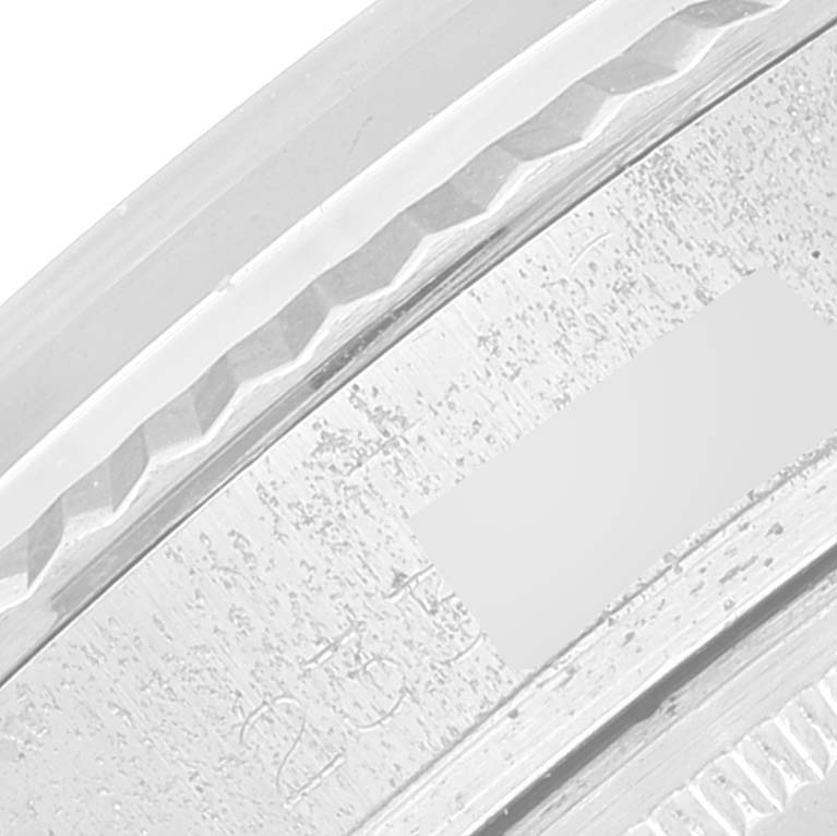 The image shows a close-up view of the bezel and part of the case for the Rolex Vintage Collection 1601 Men's Stainless Steel Silver Dial 1601 Men's Stainless Steel Silver Dial model.