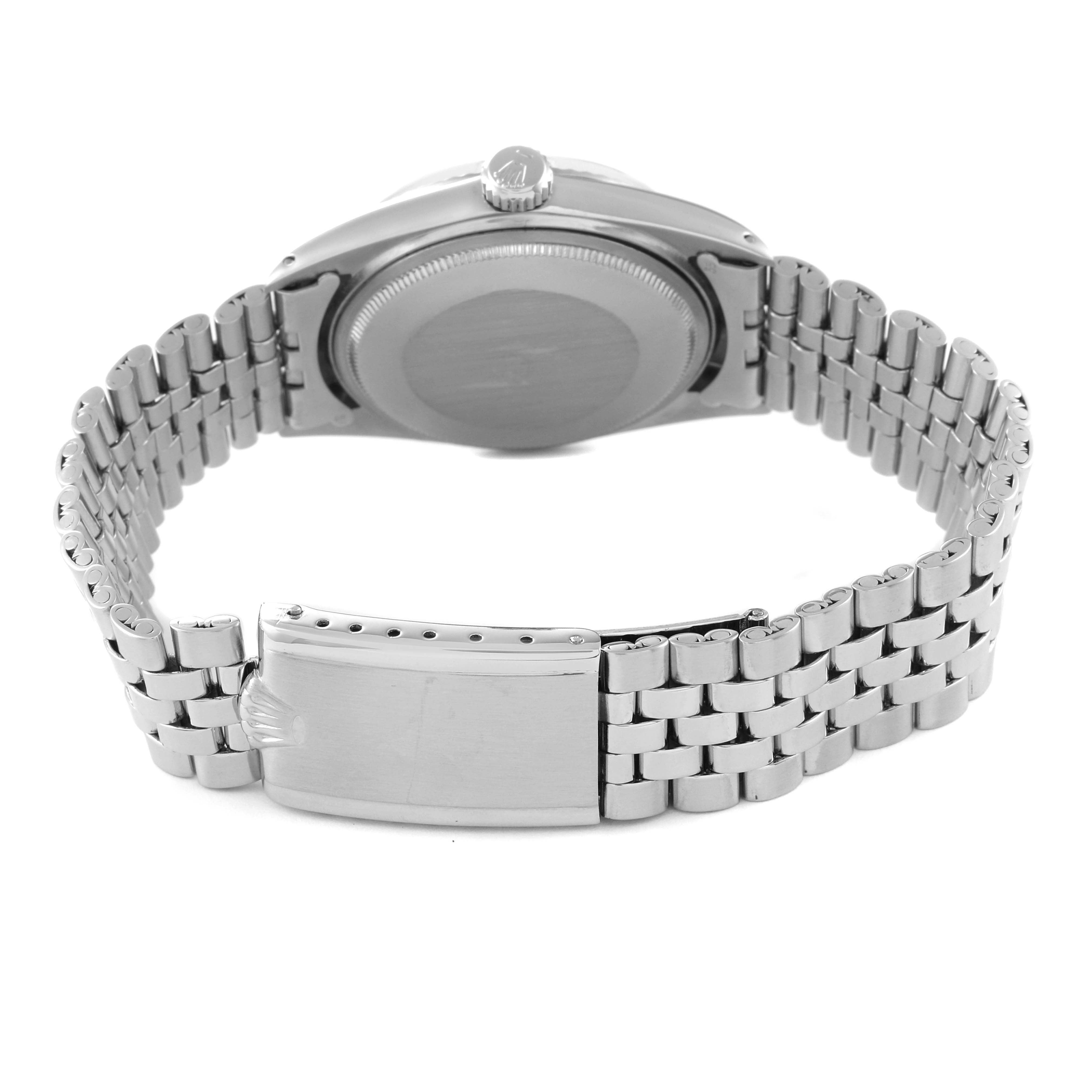 The image shows the back view of a Rolex Vintage Collection 1601 Men's Stainless Steel Silver Dial 1601 Men's Stainless Steel Silver Dial model watch, highlighting the case back and the bracelet clasp.