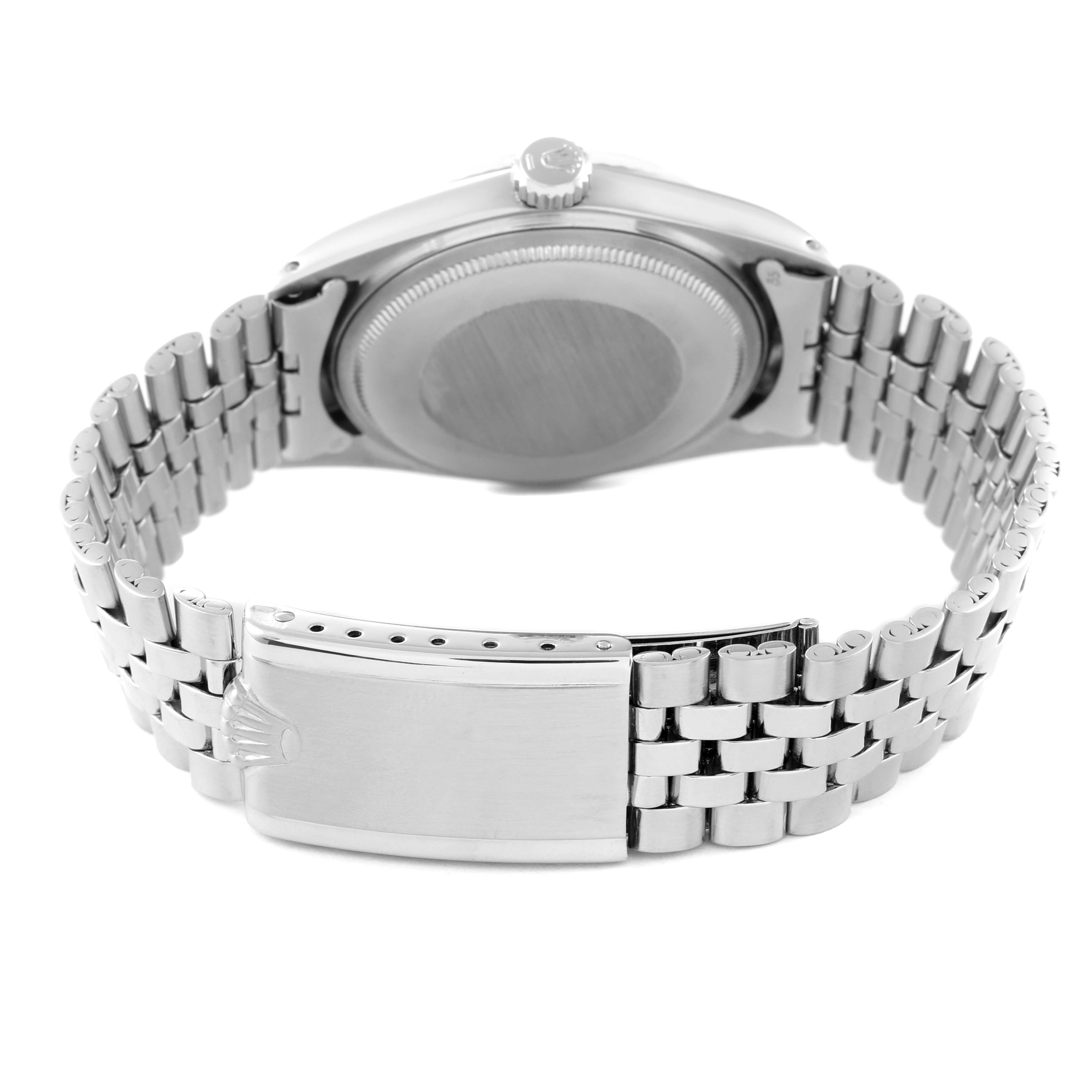 The image shows the back view of a Rolex Vintage Collection 1601 Men's Stainless Steel Silver Dial 1601 Men's Stainless Steel Silver Dial watch, focusing on the clasp, bracelet, and case back.