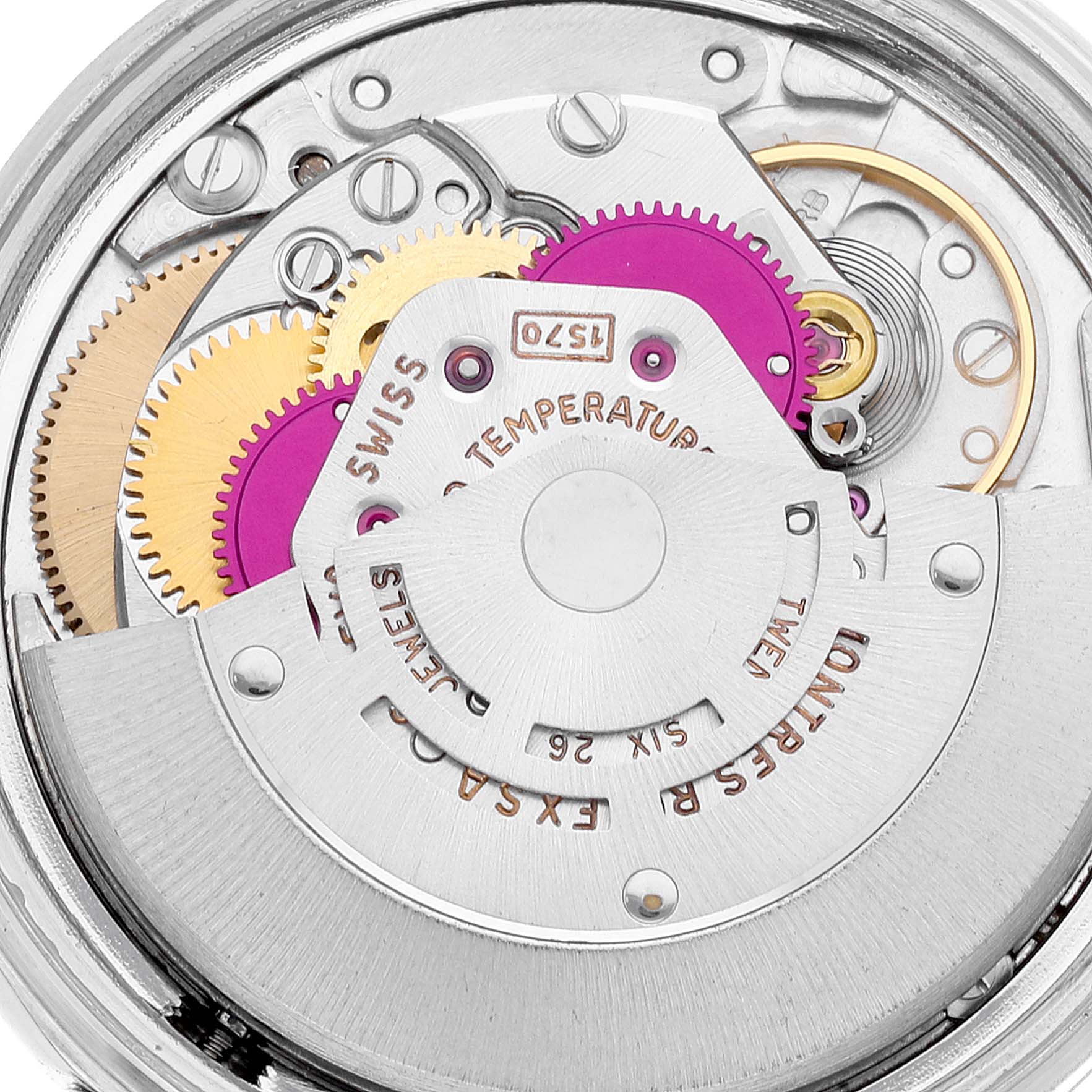 This is a close-up view of the internal mechanism of a Vintage Collection Rolex watch, showcasing gears and intricate components.