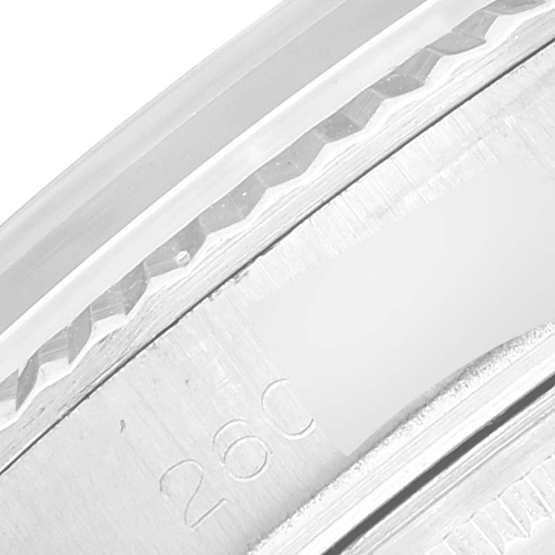 The image shows a close-up detail of the edge and serial number area on a Rolex Vintage Collection 1601 Men's Stainless Steel Silver Dial 1601 Men's Stainless Steel Silver Dial model.