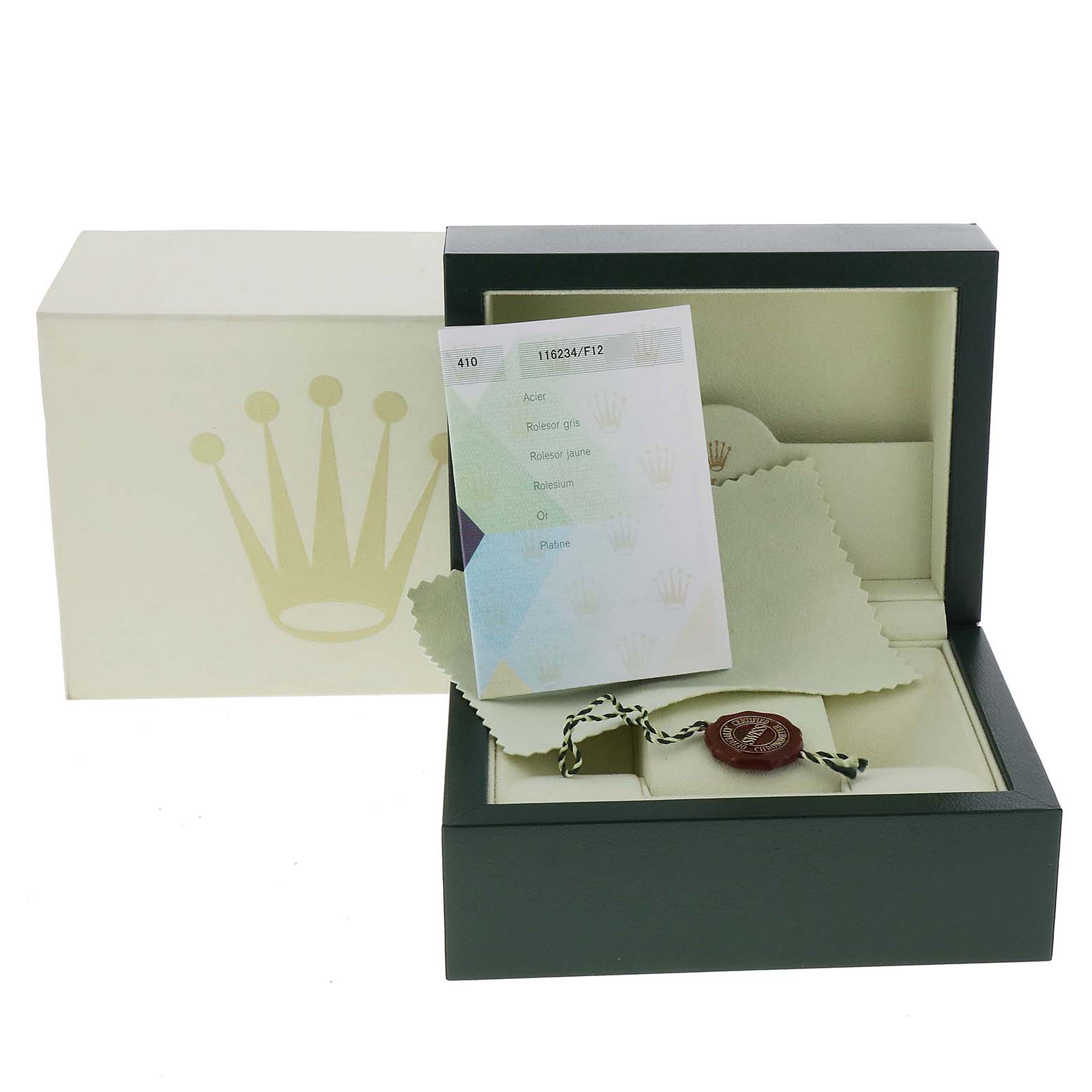 The image shows a Rolex Datejust 116234 Men's Stainless Steel White Dial 116234 Men's Stainless Steel White Dial watch box and accessories from a front angle, including the tag, booklet, and cleaning cloth.