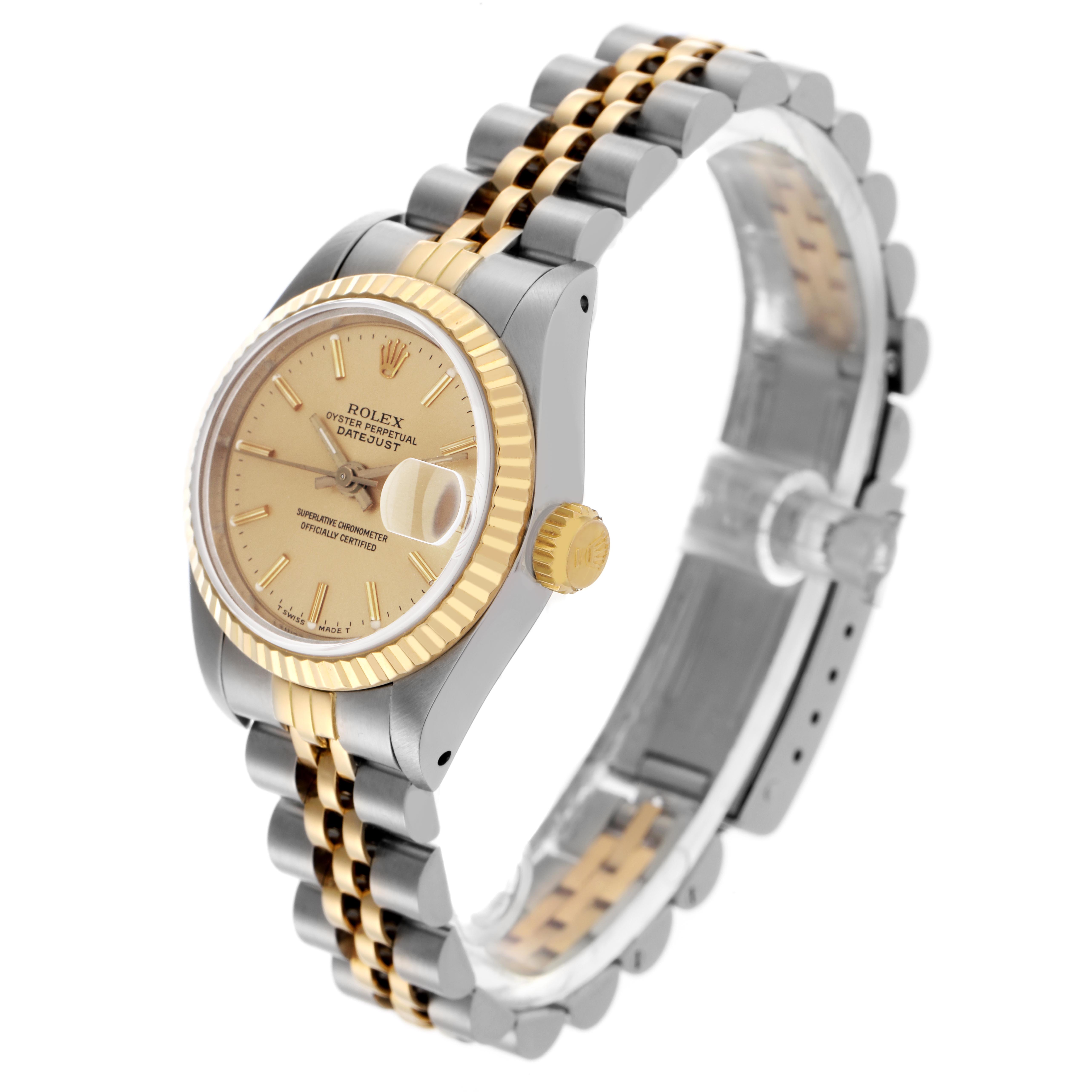 This Rolex Datejust 69173 Women
s Steel and Gold (two tone) Champagne Dial 69173 Women
s Steel and Gold (two tone) Champagne Dial watch is shown at a three-quarter angle, displaying the bezel, dial, bracelet, and crown.
