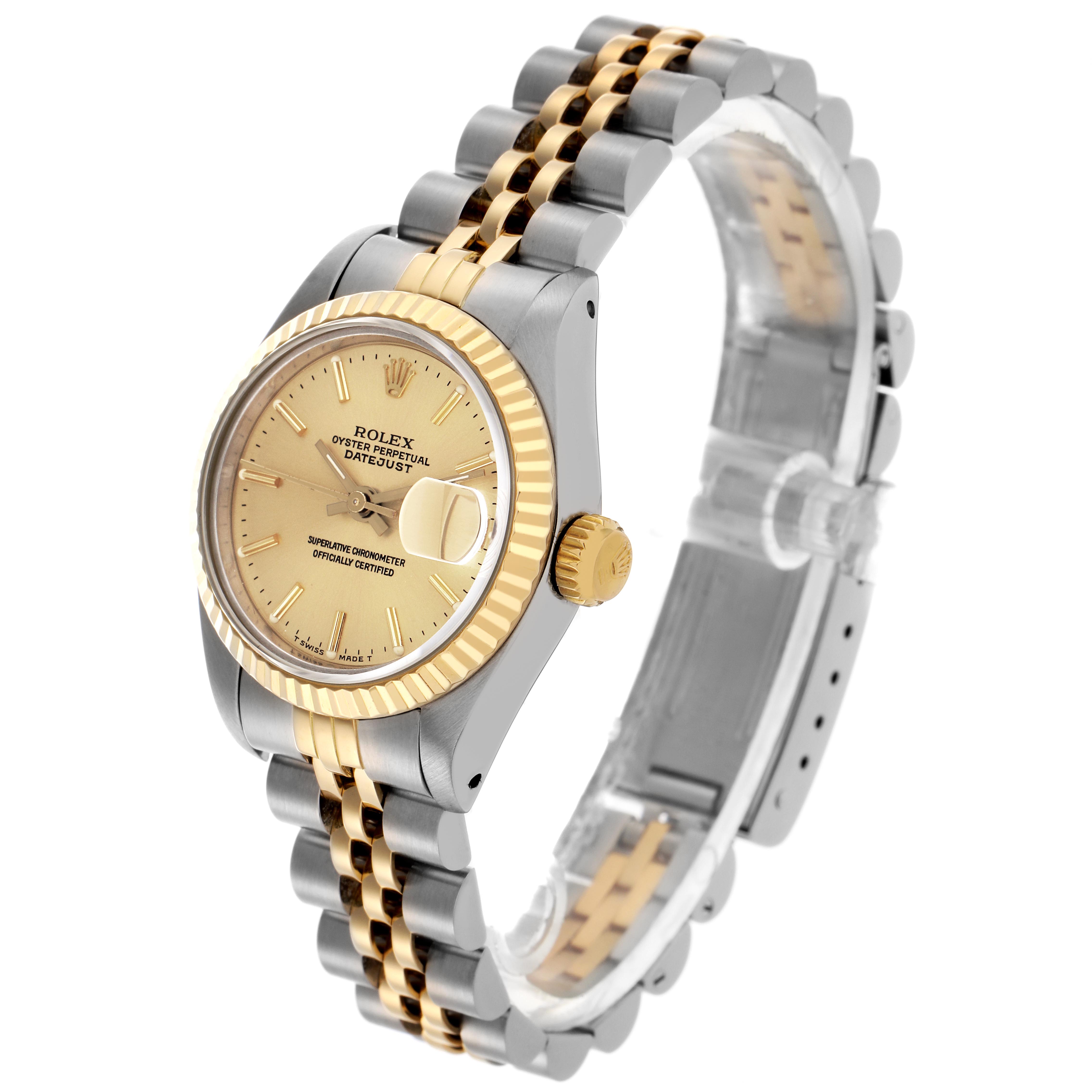 The Rolex Datejust 69173 Women
s Steel and Gold (two tone) Champagne Dial 69173 Women
s Steel and Gold (two tone) Champagne Dial watch is shown at a three-quarter angle, highlighting the face, bezel, crown, and two-tone bracelet.