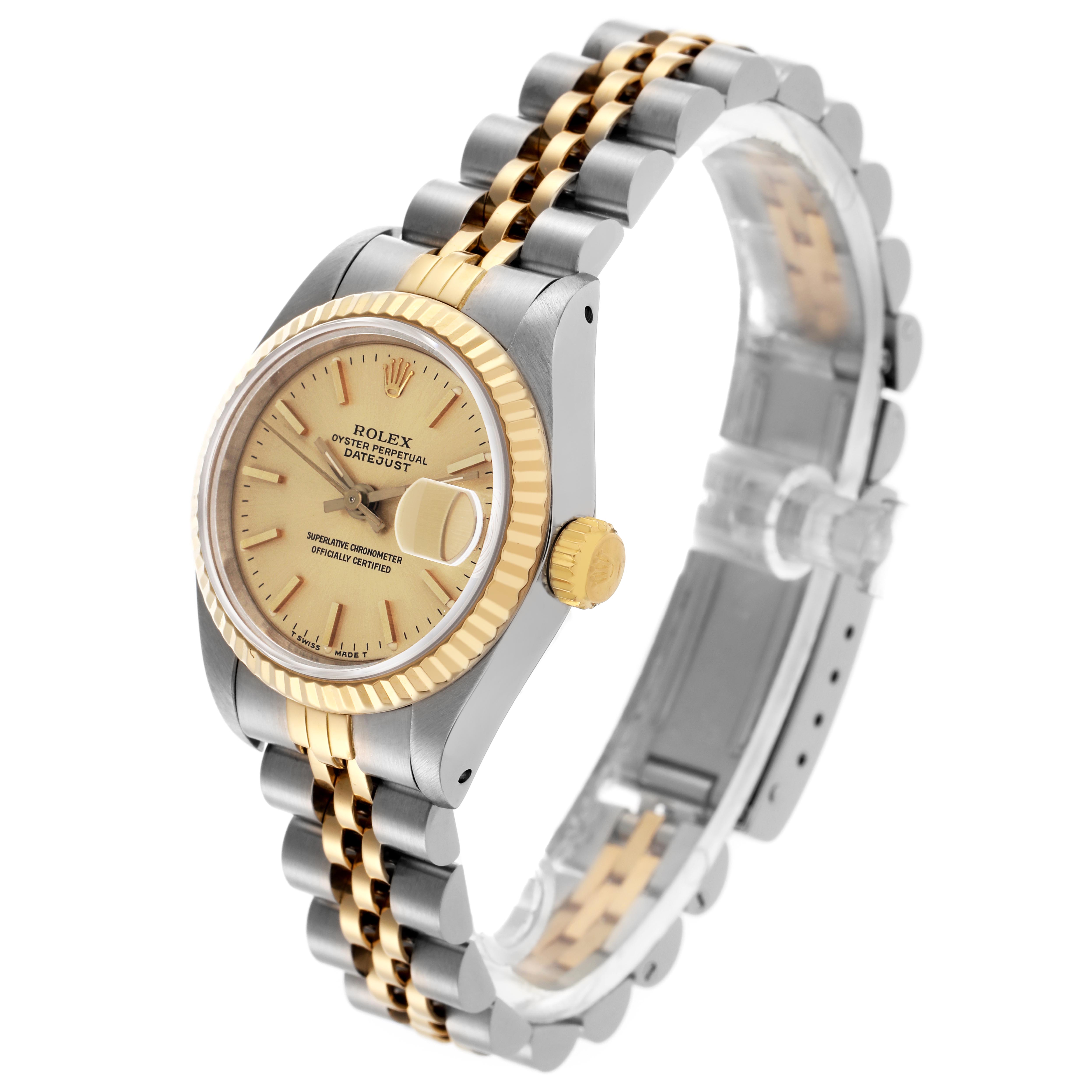 The Rolex Datejust 69173 Women's Steel and Gold (two tone) Champagne Dial 69173 Women's Steel and Gold (two tone) Champagne Dial watch is shown from an angled side view, highlighting the dial, bezel, and two-tone bracelet.