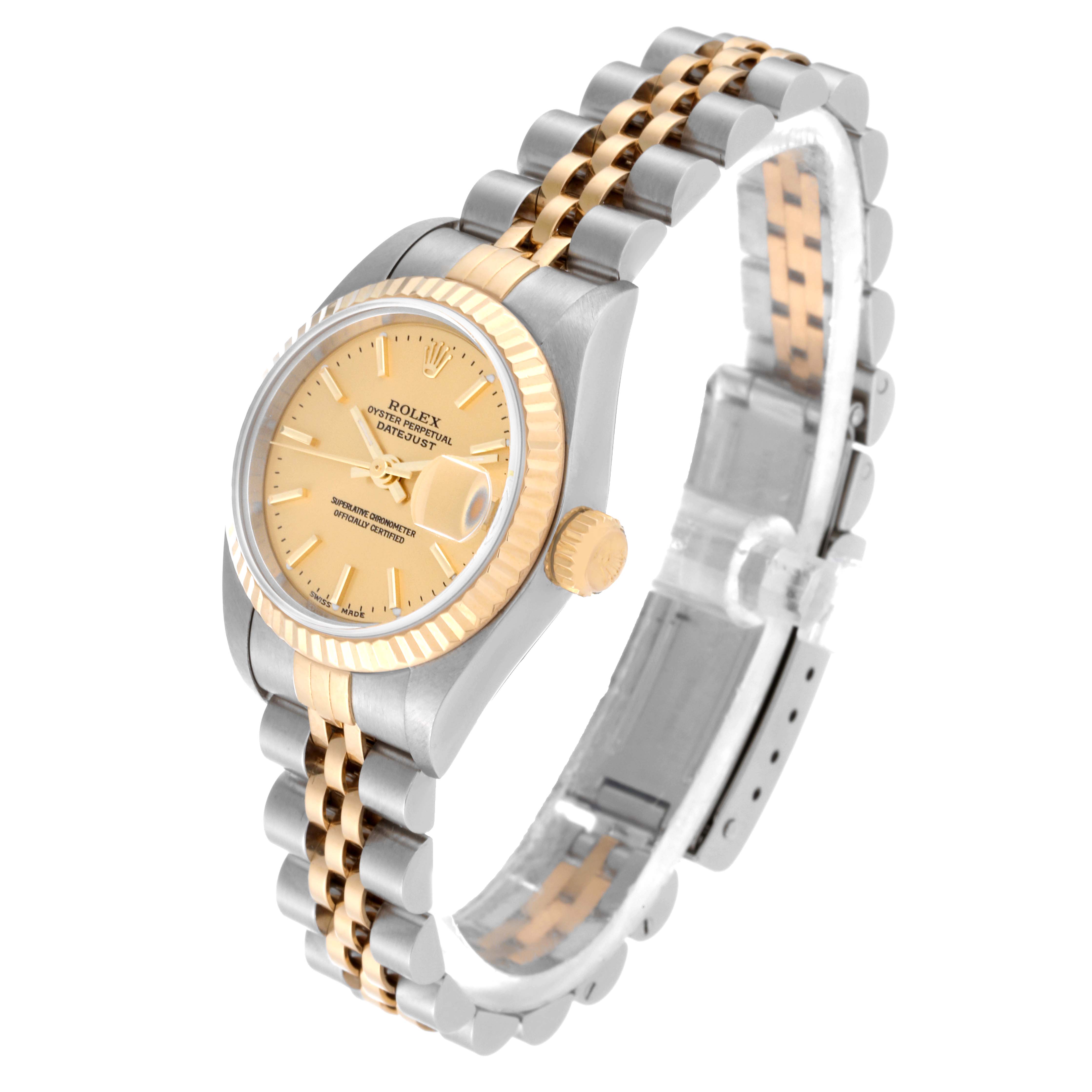 This image shows the Rolex Datejust 79173 Women's Steel and Gold (two tone) Champagne Dial 79173 Women's Steel and Gold (two tone) Champagne Dial watch at an angled view, highlighting its face, bezel, crown, and two-tone bracelet.