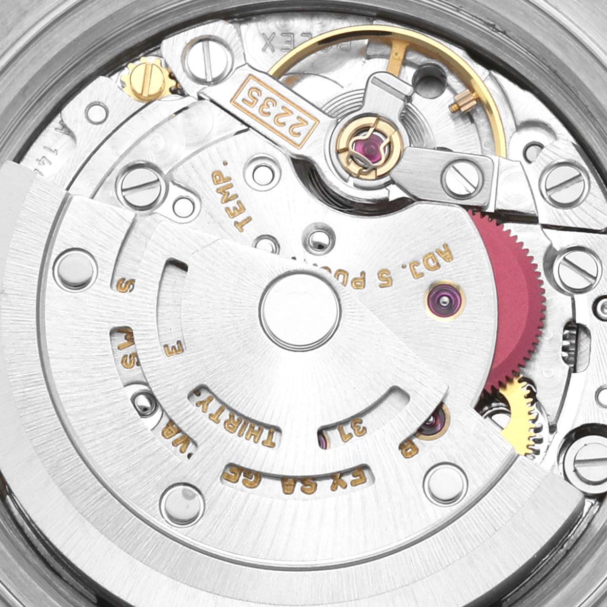 The image shows a close-up of the movement mechanism of the Rolex Datejust 79173 Women's Steel and Gold (two tone) Champagne Dial 79173 Women's Steel and Gold (two tone) Champagne Dial watch, highlighting its internal components.
