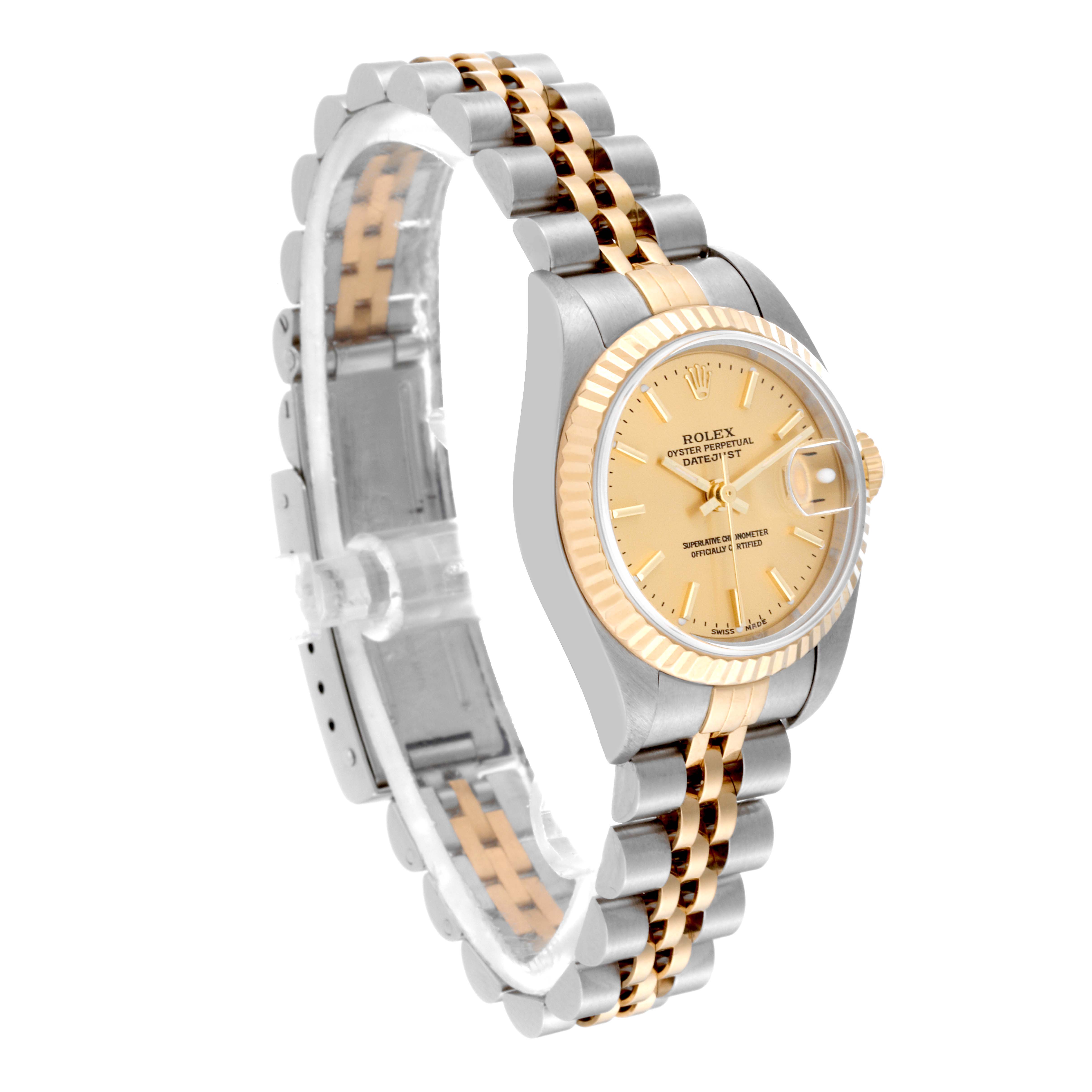 The image shows a Rolex Datejust 79173 Women's Steel and Gold (two tone) Champagne Dial 79173 Women's Steel and Gold (two tone) Champagne Dial watch angled in a three-quarter view, clearly displaying its face, bezel, and jubilee bracelet.