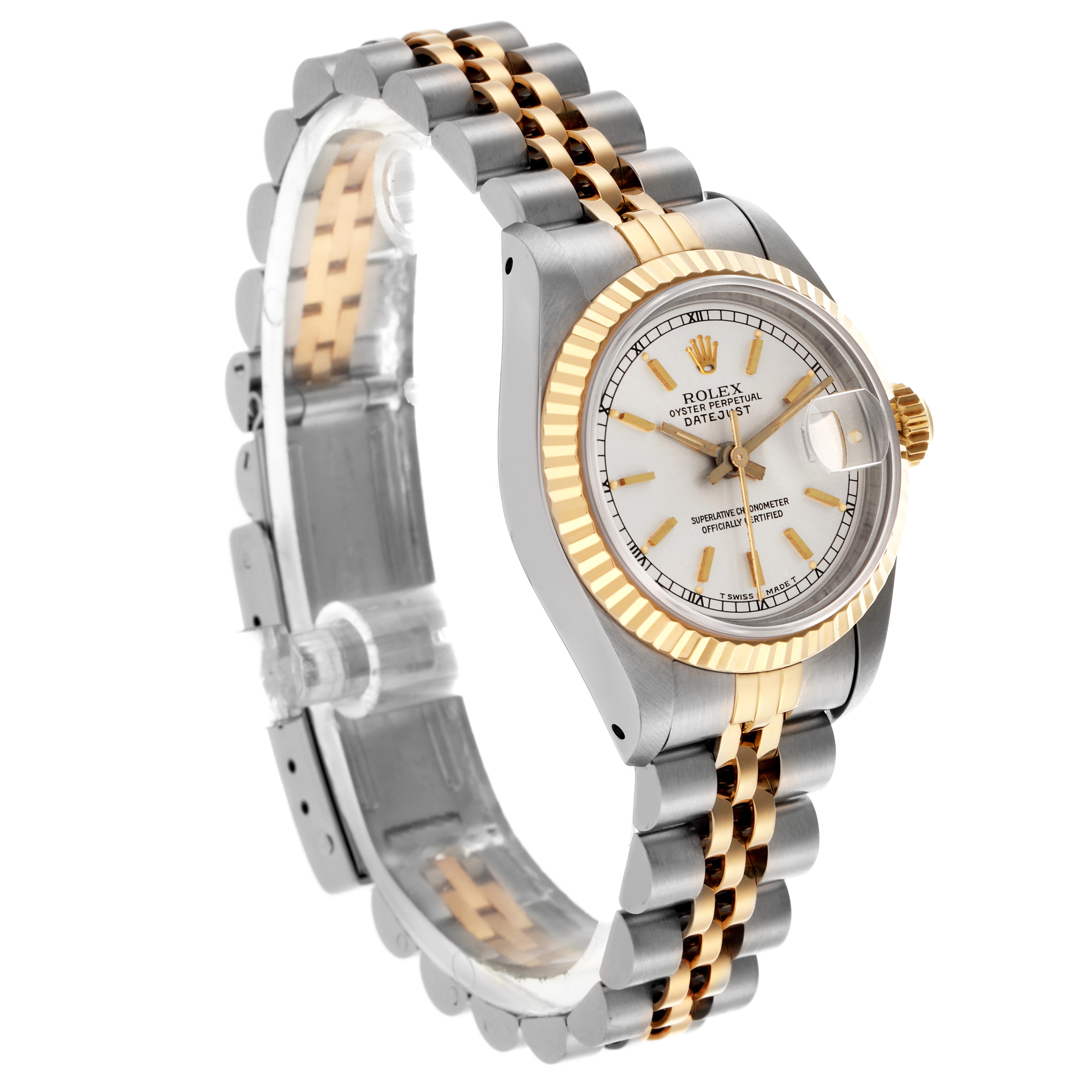 The Rolex Datejust 69173 Women
s Steel and Gold (two tone) Silver Dial 69173 Women
s Steel and Gold (two tone) Silver Dial watch is shown from an angled side view, highlighting the bezel, dial, and bracelet.