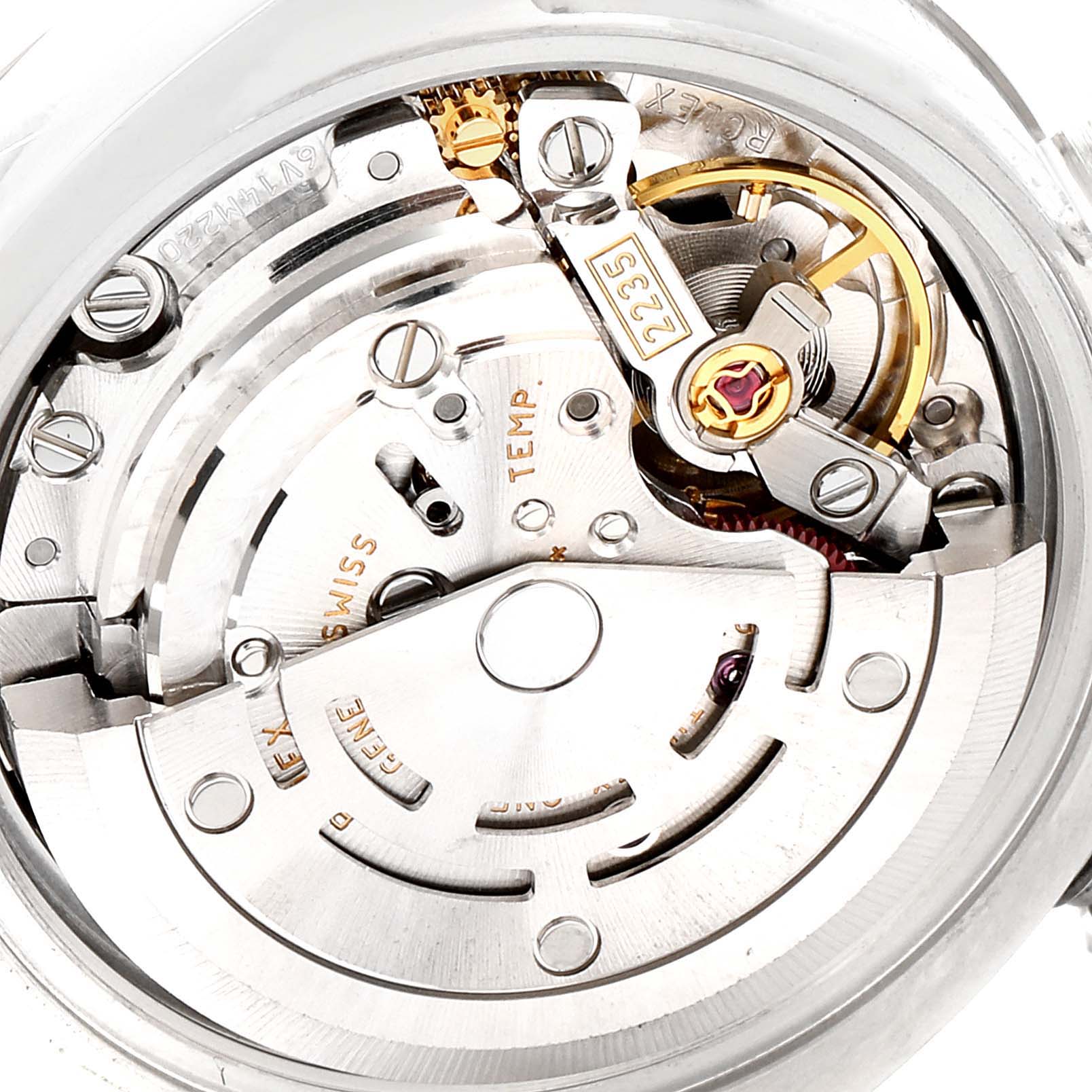 The image shows a close-up of the movement mechanism from the rear of a Rolex Datejust 179174 Women's Stainless Steel Black Dial 179174 Women's Stainless Steel Black Dial watch.