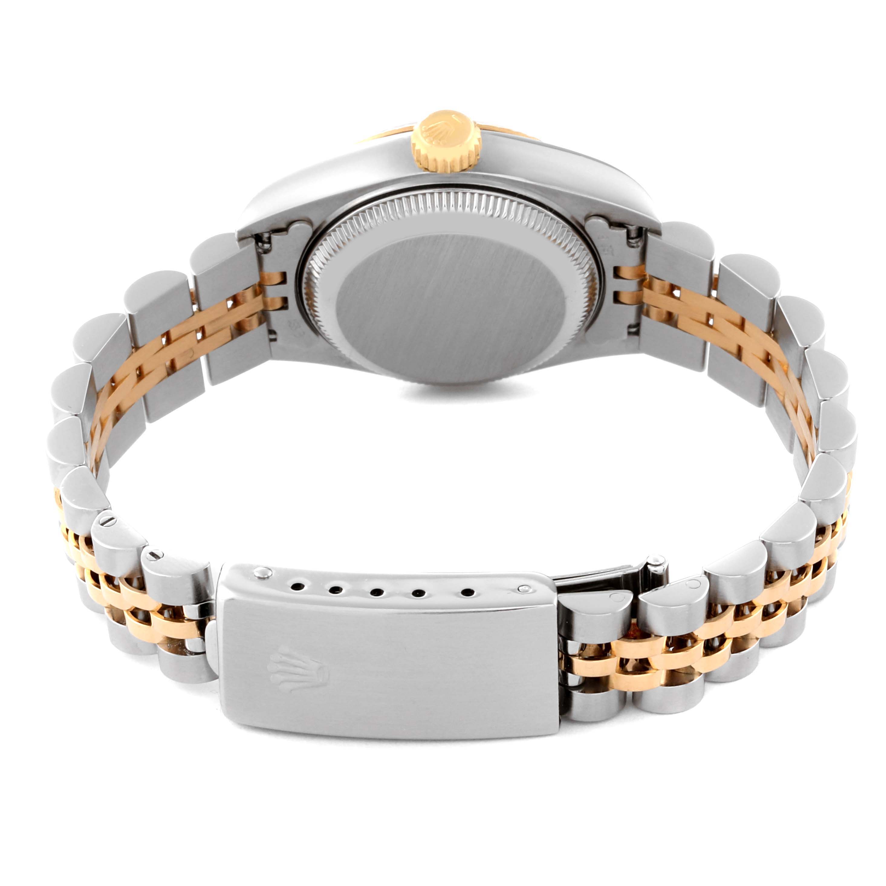 The Rolex Datejust 69173 Women's Steel and Gold (two tone) White Dial 69173 Women's Steel and Gold (two tone) White Dial watch is shown from the back with its clasp, bracelet, case back, and crown visible.