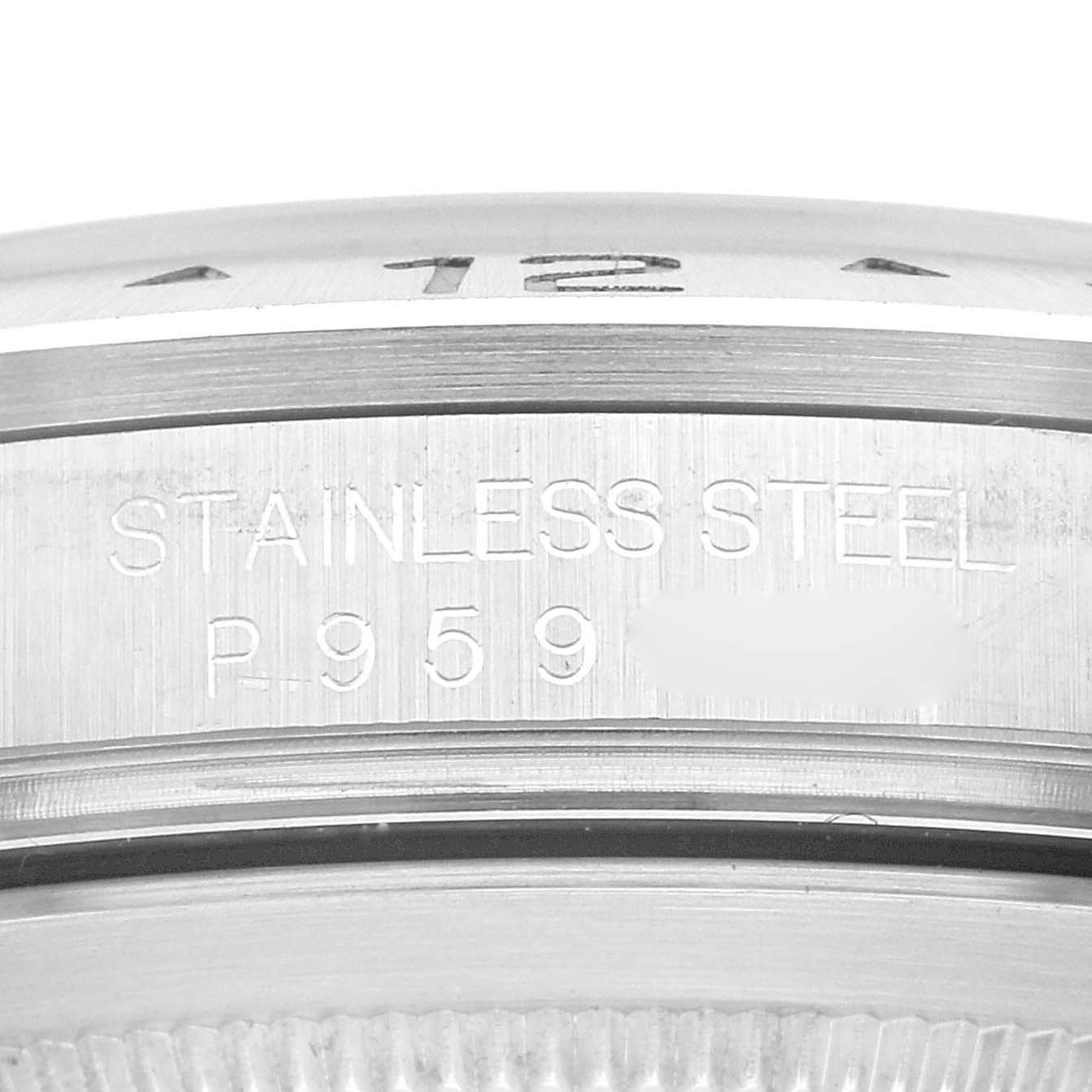 The image shows a close-up of the engraved side of a stainless steel Rolex Explorer 16570 Men
s Stainless Steel White Dial 16570 Men
s Stainless Steel White Dial watch case.