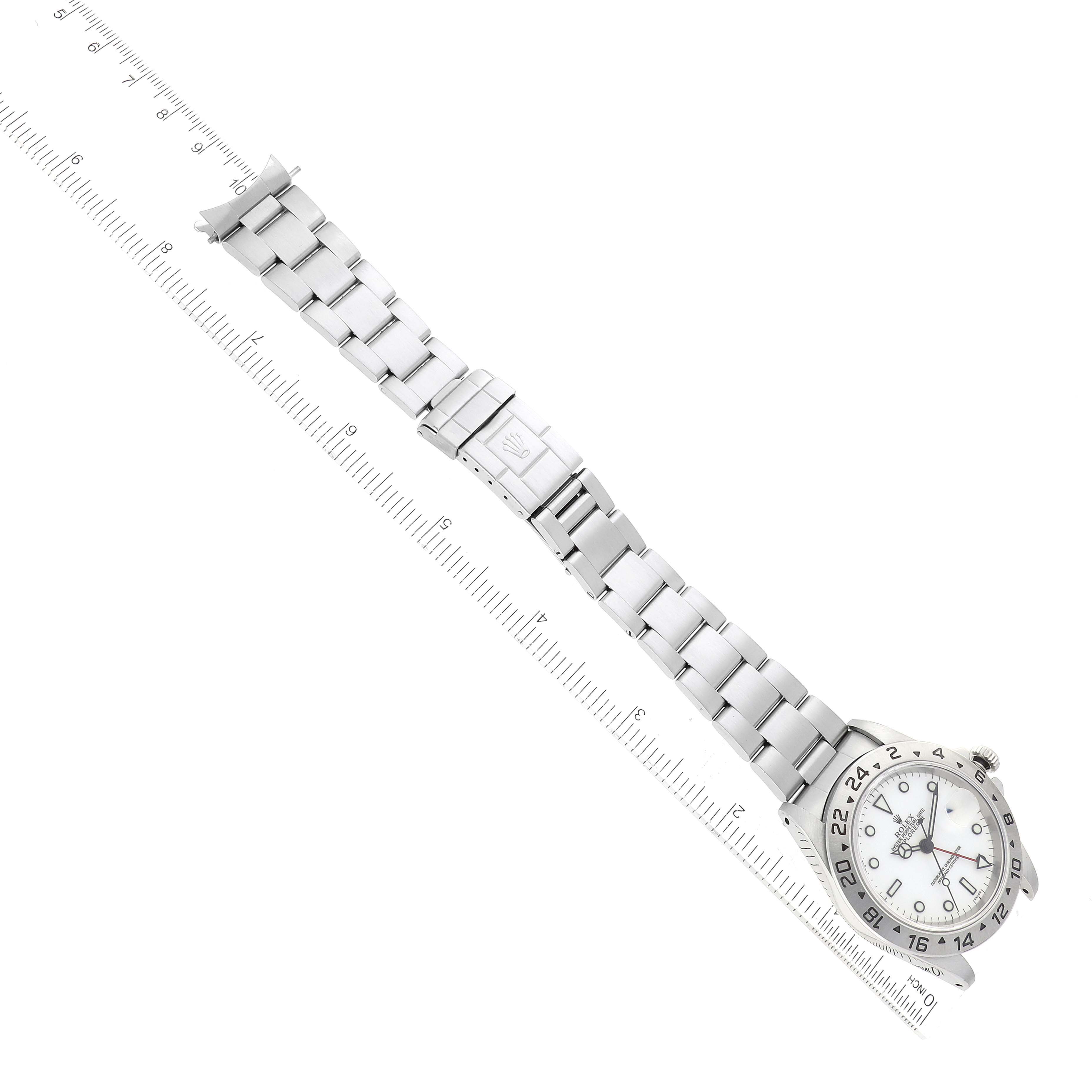 This image shows a side angle of a Rolex Explorer 16570 Men
s Stainless Steel White Dial 16570 Men
s Stainless Steel White Dial watch, highlighting its metal bracelet and clasp.