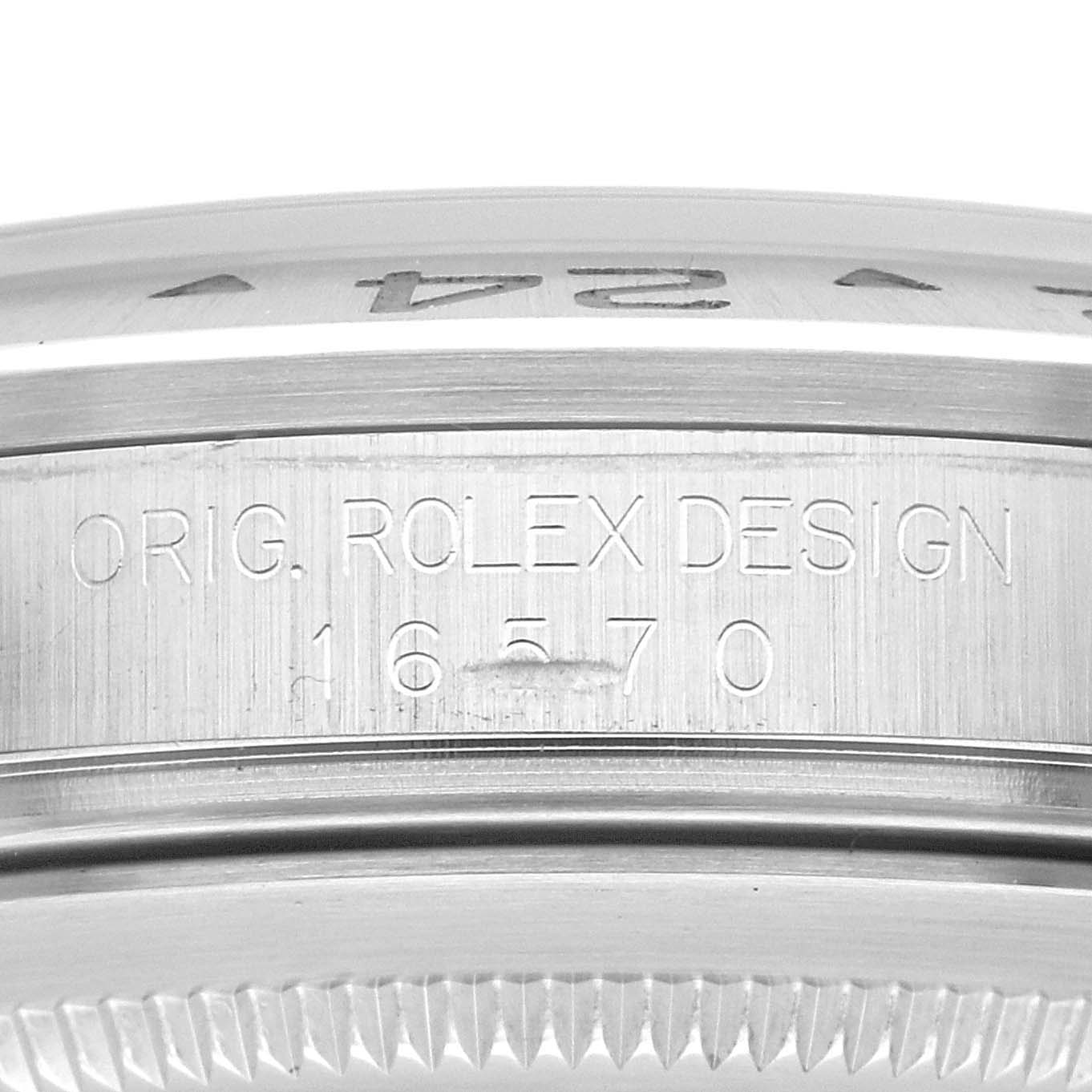 The image shows a close-up of the engraving on the case side of a Rolex Explorer 16570 Men
s Stainless Steel White Dial 16570 Men
s Stainless Steel White Dial model 16570.