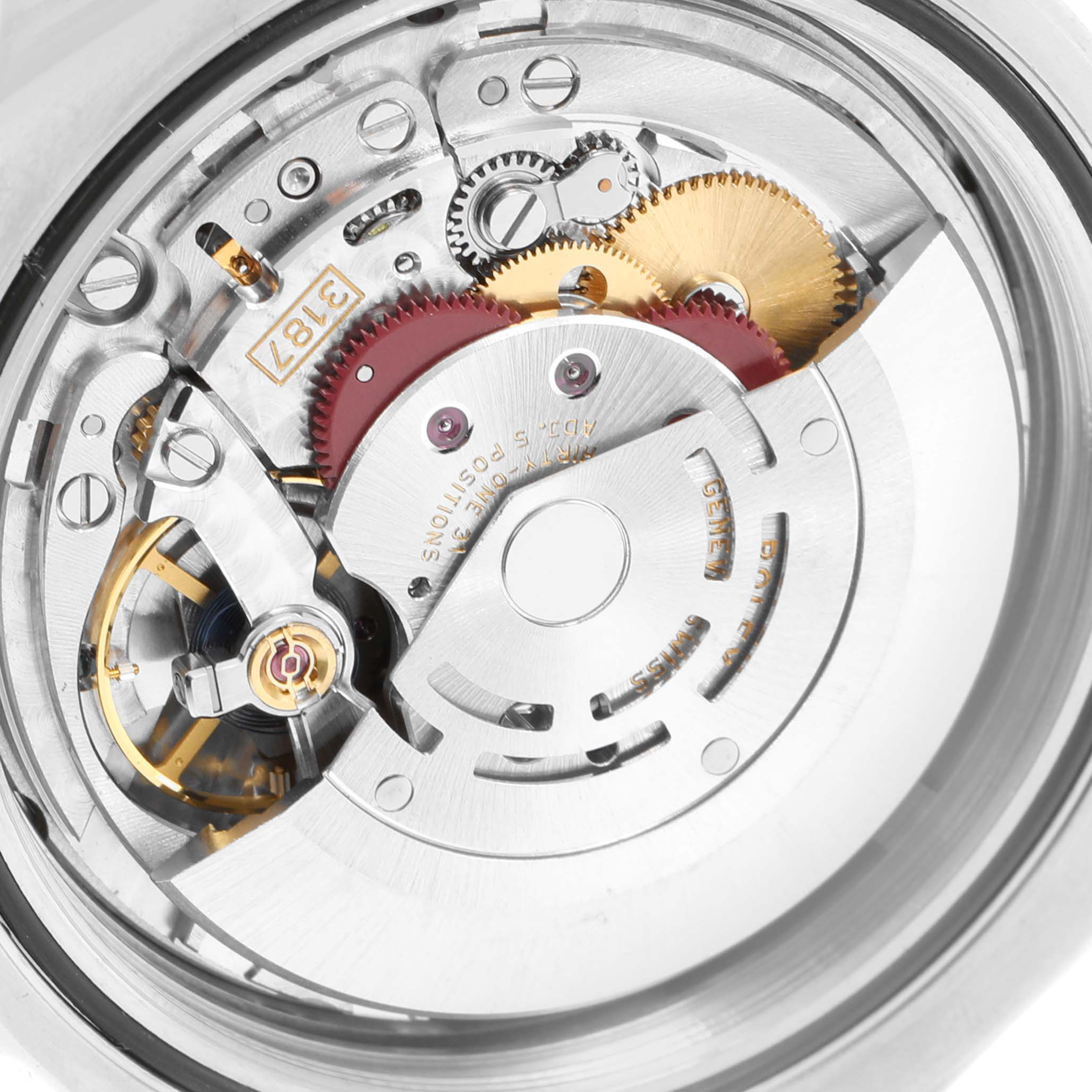 This is a close-up of the internal mechanism of a Rolex Explorer 216570 Men's Stainless Steel Black Dial 216570 Men's Stainless Steel Black Dial watch, showcasing its intricate gears and components.