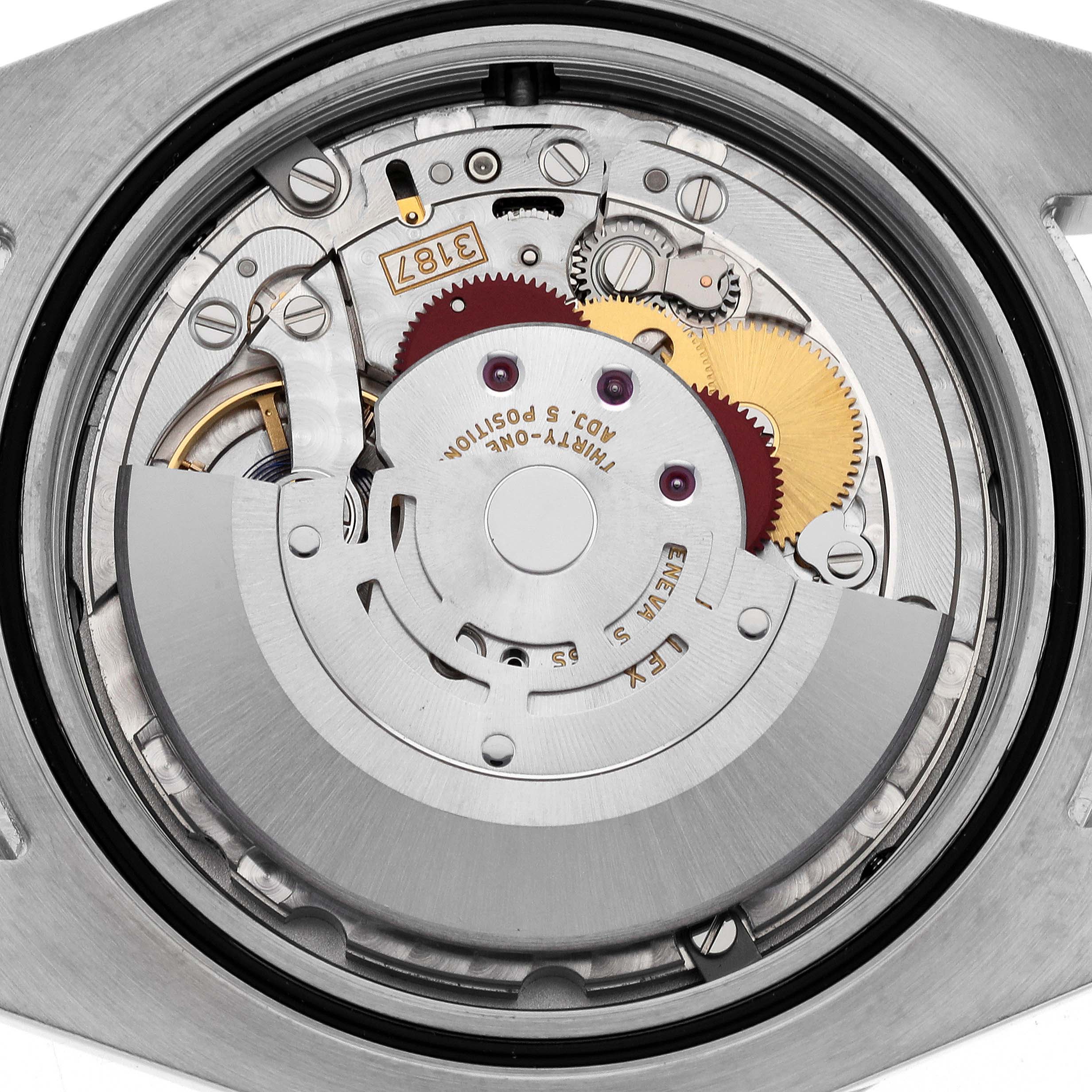 This image shows the inner mechanics and movement of a Rolex Explorer 216570 Men
s Stainless Steel Black Dial 216570 Men
s Stainless Steel Black Dial watch from a top-down angle.
