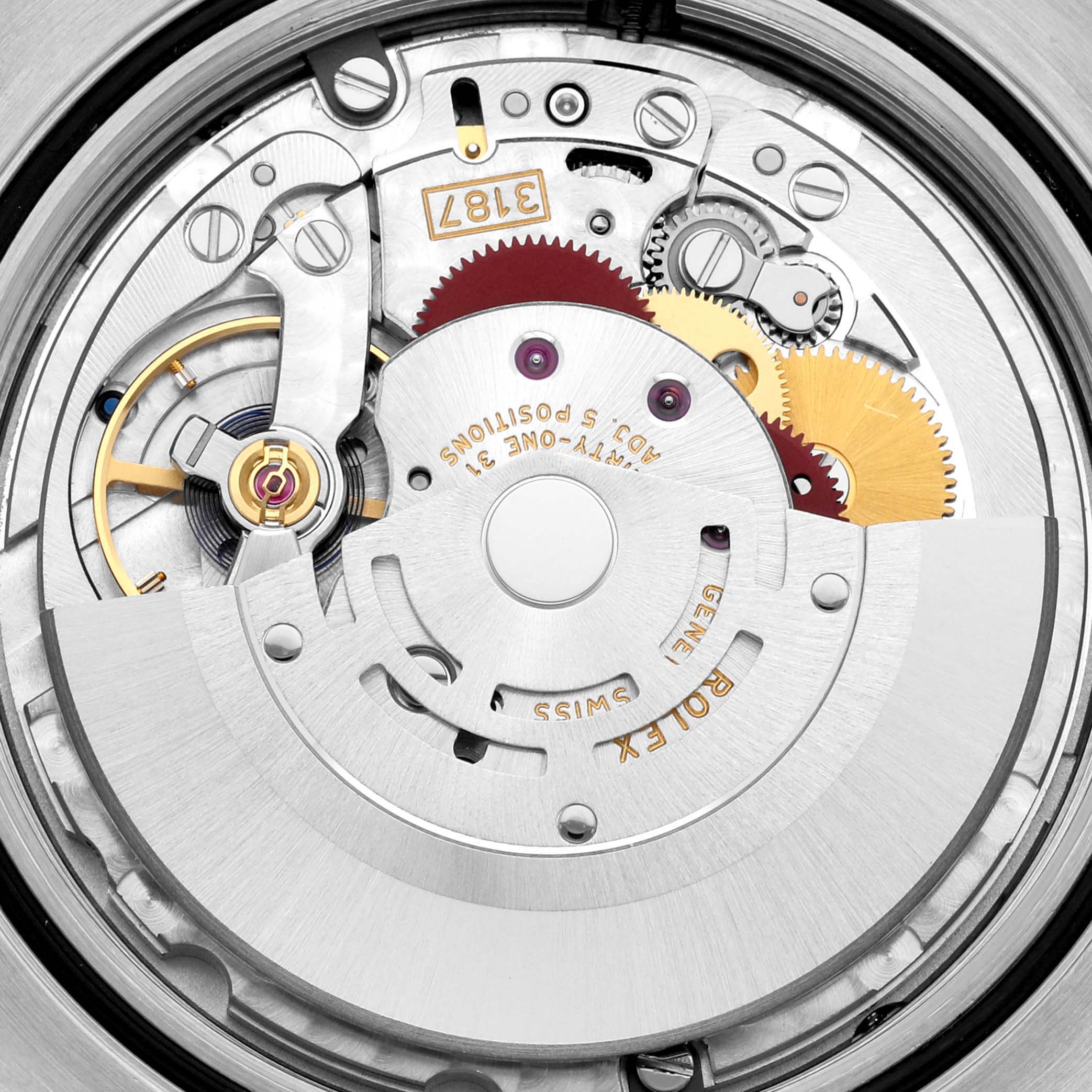 The image shows the intricate internal movement mechanism of a Rolex Explorer 216570 Men
s Stainless Steel Black Dial 216570 Men
s Stainless Steel Black Dial watch.