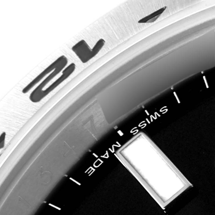 The close-up image shows the bezel, a part of the dial, and the "Swiss Made" mark on a Rolex Explorer 216570 Men
s Stainless Steel Black Dial 216570 Men
s Stainless Steel Black Dial watch.
