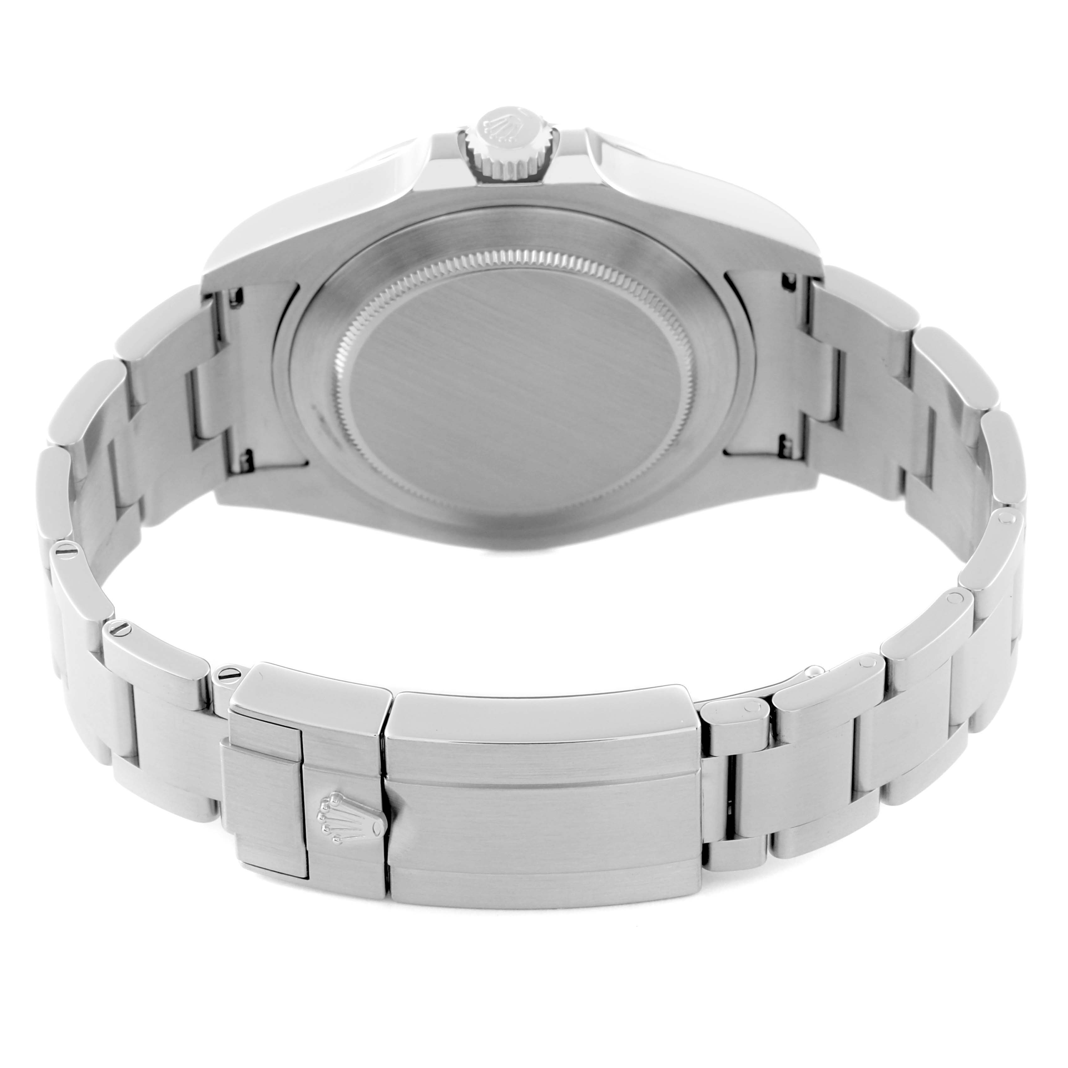 The image shows the back view of a Rolex Explorer 216570 Men
s Stainless Steel Black Dial 216570 Men
s Stainless Steel Black Dial watch, highlighting its stainless steel case, bracelet, and clasp.