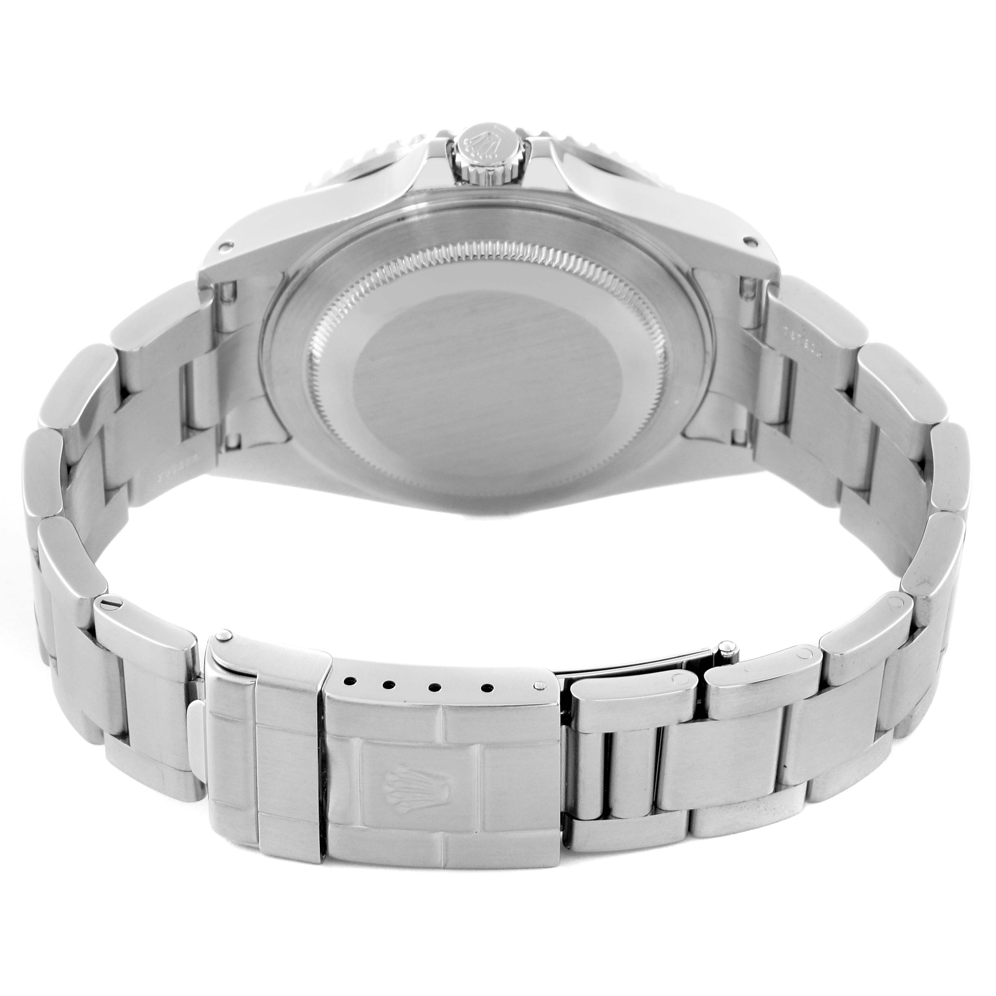 The image shows the underside of a Rolex GMT-Master 16710 Men's Stainless Steel Black Dial 16710 Men's Stainless Steel Black Dial watch, highlighting the closed case back and clasp.