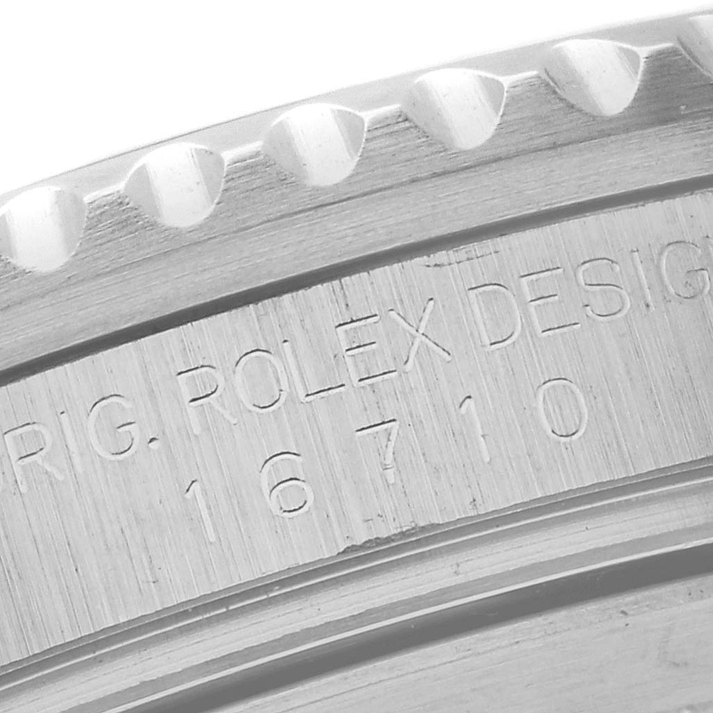 The image shows a close-up of the bezel and engraved model number "16710" on the side of a Rolex GMT-Master 16710 Men's Stainless Steel Black Dial 16710 Men's Stainless Steel Black Dial watch.