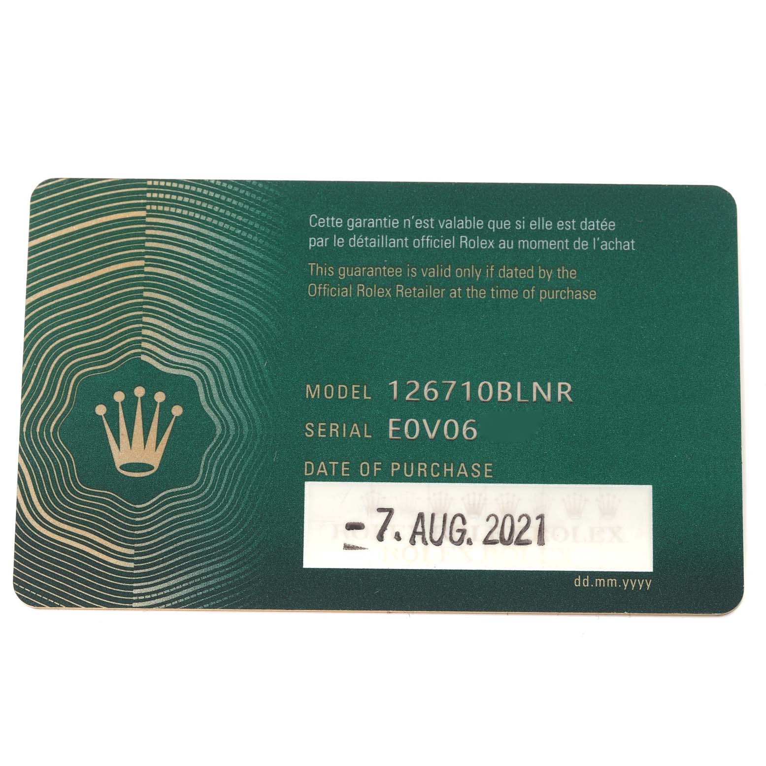 This image shows a warranty card for a Rolex GMT-Master 126710BLNR Men's Stainless Steel Black Dial 126710BLNR Men's Stainless Steel Black Dial model 126710BLNR, displaying the serial number and the date of purchase.