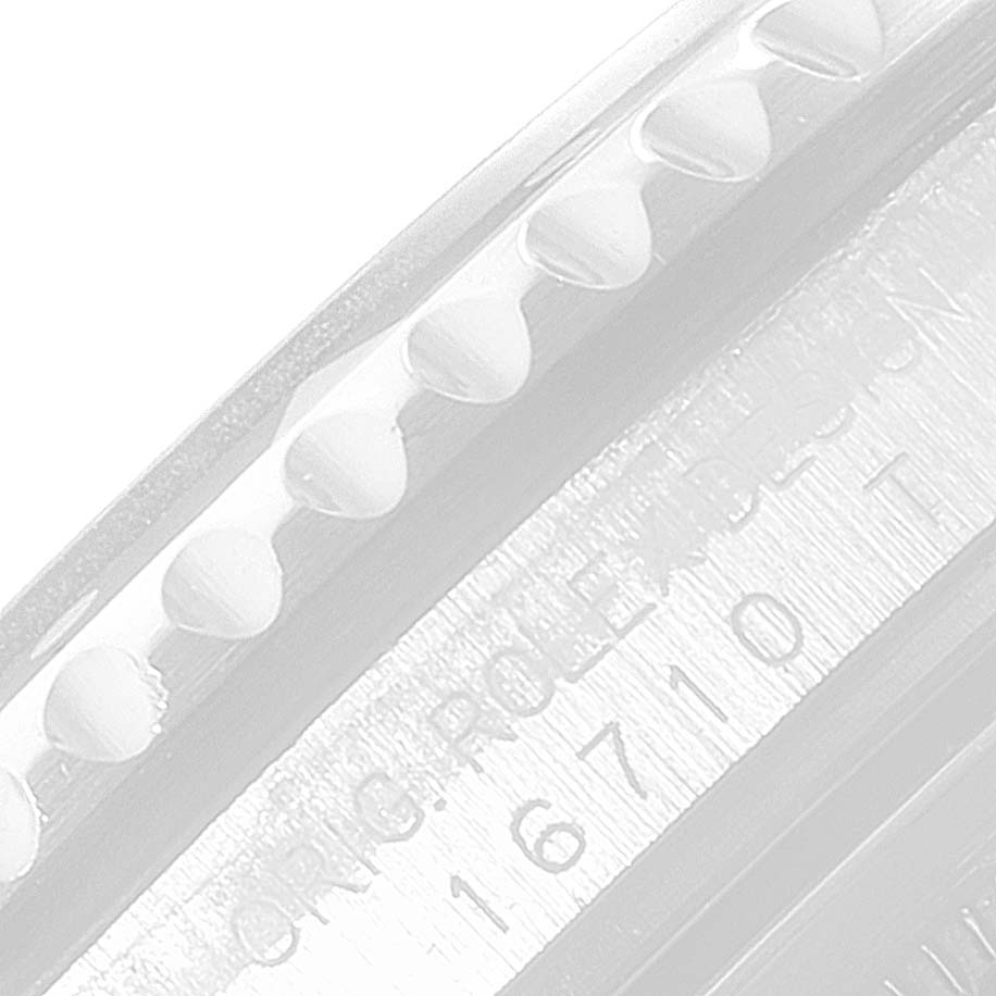 The image shows a close-up of the side of the bezel and case engraving of a Rolex GMT-Master 16710 Men's Stainless Steel Black Dial 16710 Men's Stainless Steel Black Dial watch.