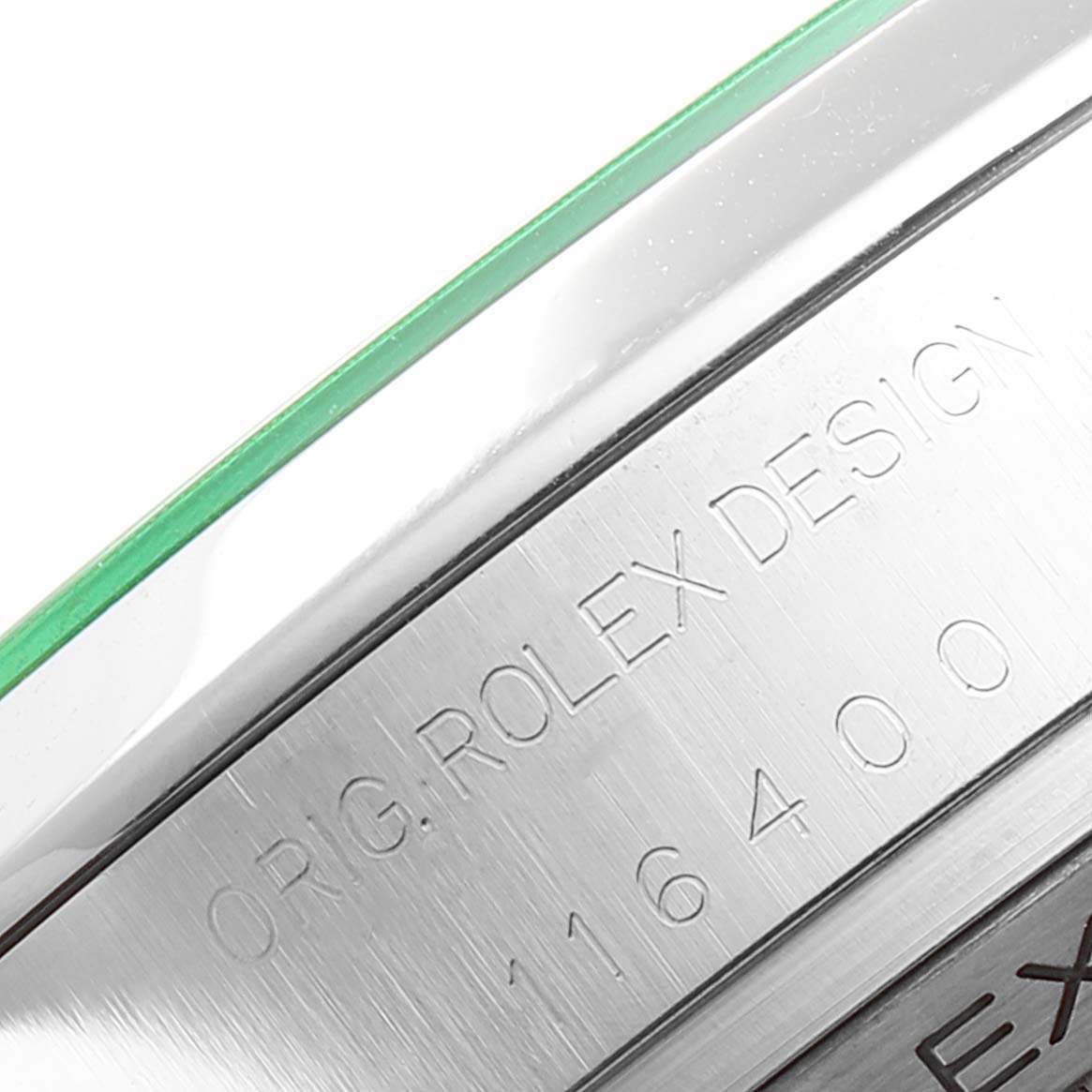 The image shows a close-up angle of the case side of a Rolex Milgauss 116400GV Men's Stainless Steel Black Dial 116400GV Men's Stainless Steel Black Dial, highlighting its engraved serial number and "ORIG. ROLEX DESIGN".